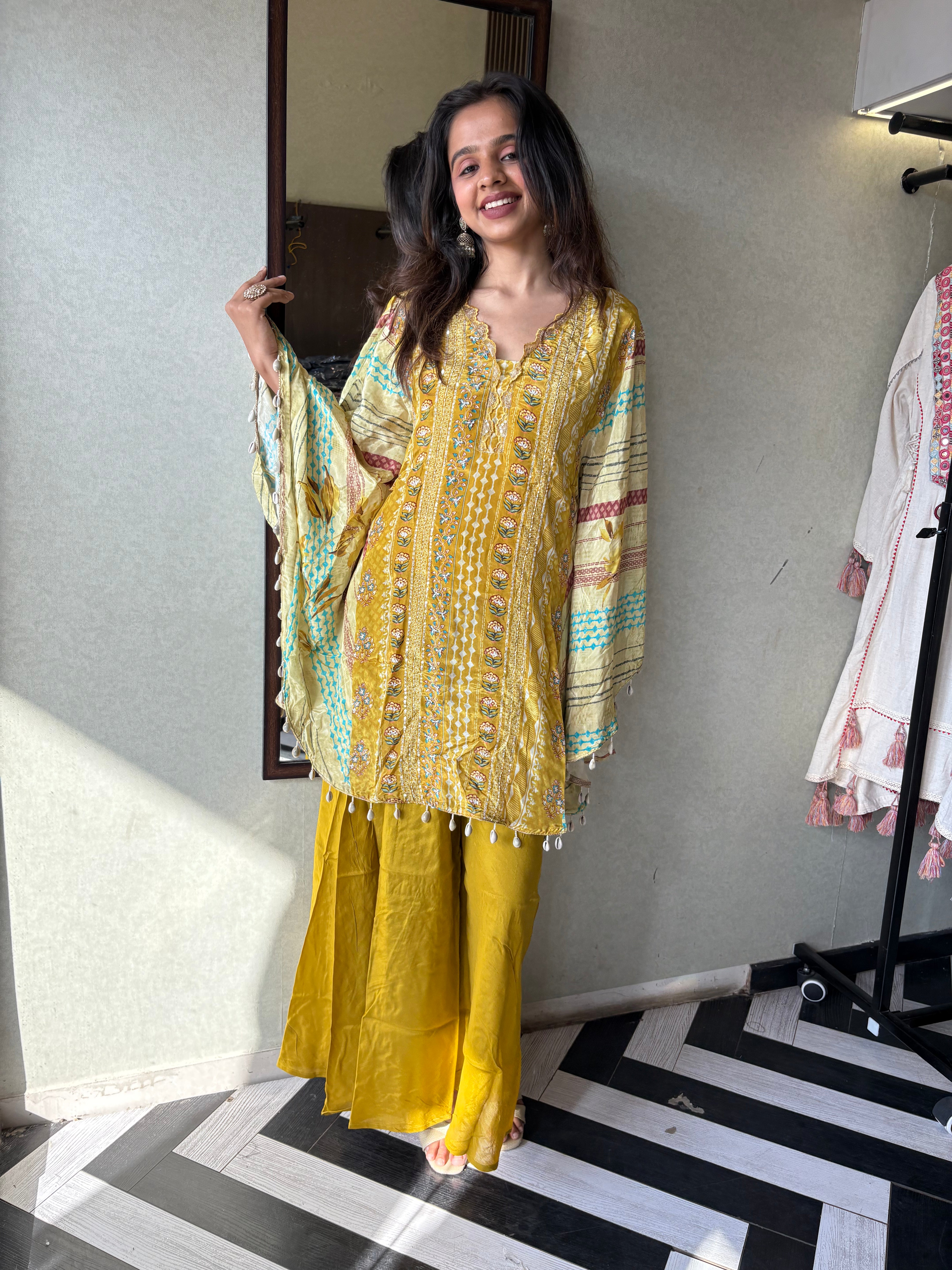 Image of Crafted from pure crepe fabric with hand-sequenced accessory work - it's the sunshine outfit your wardrobe needs!