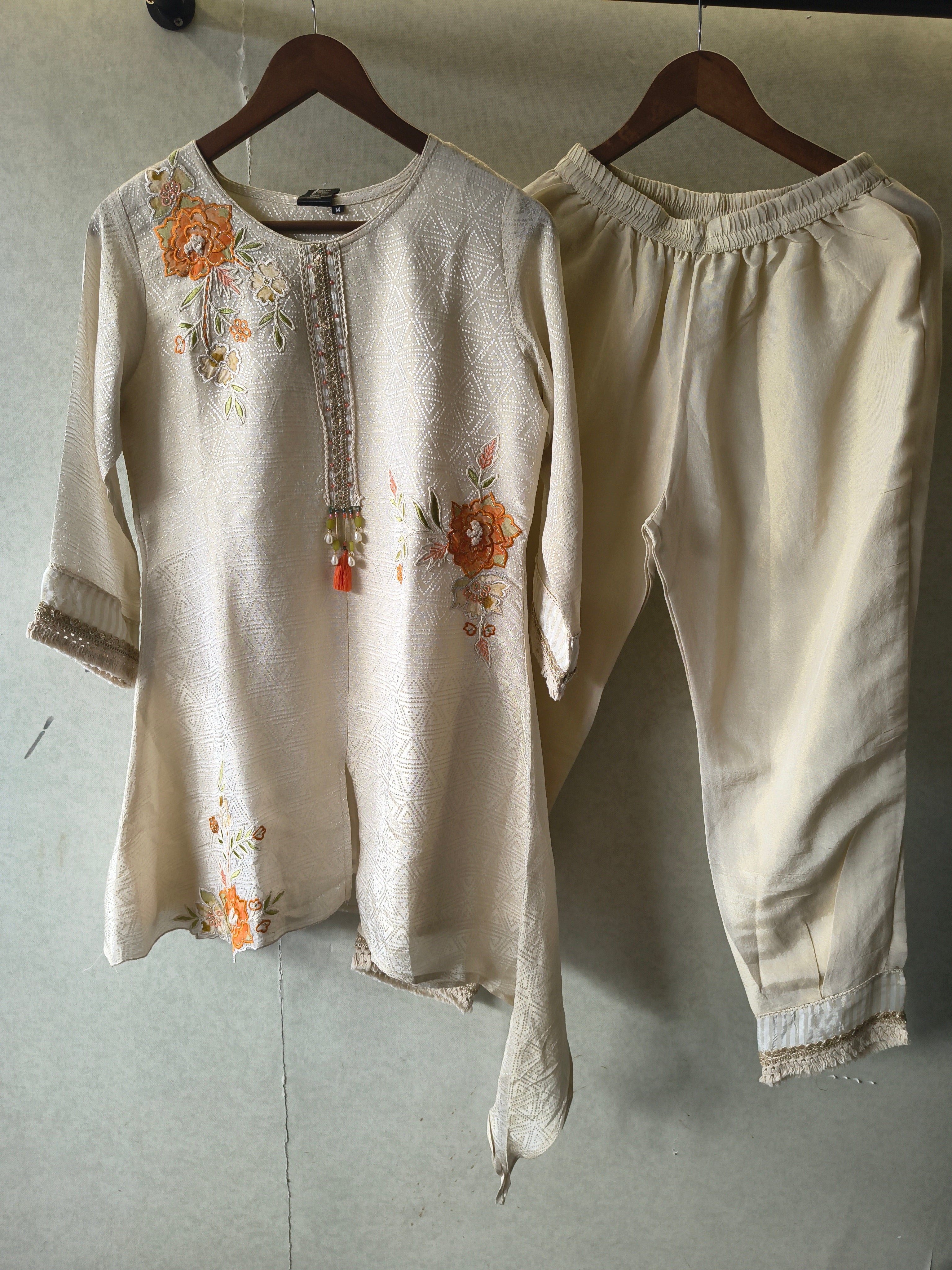 Image of Ivory Floral Embroidered Premium Asymmetrical Kurta Pant Co-Ord Set