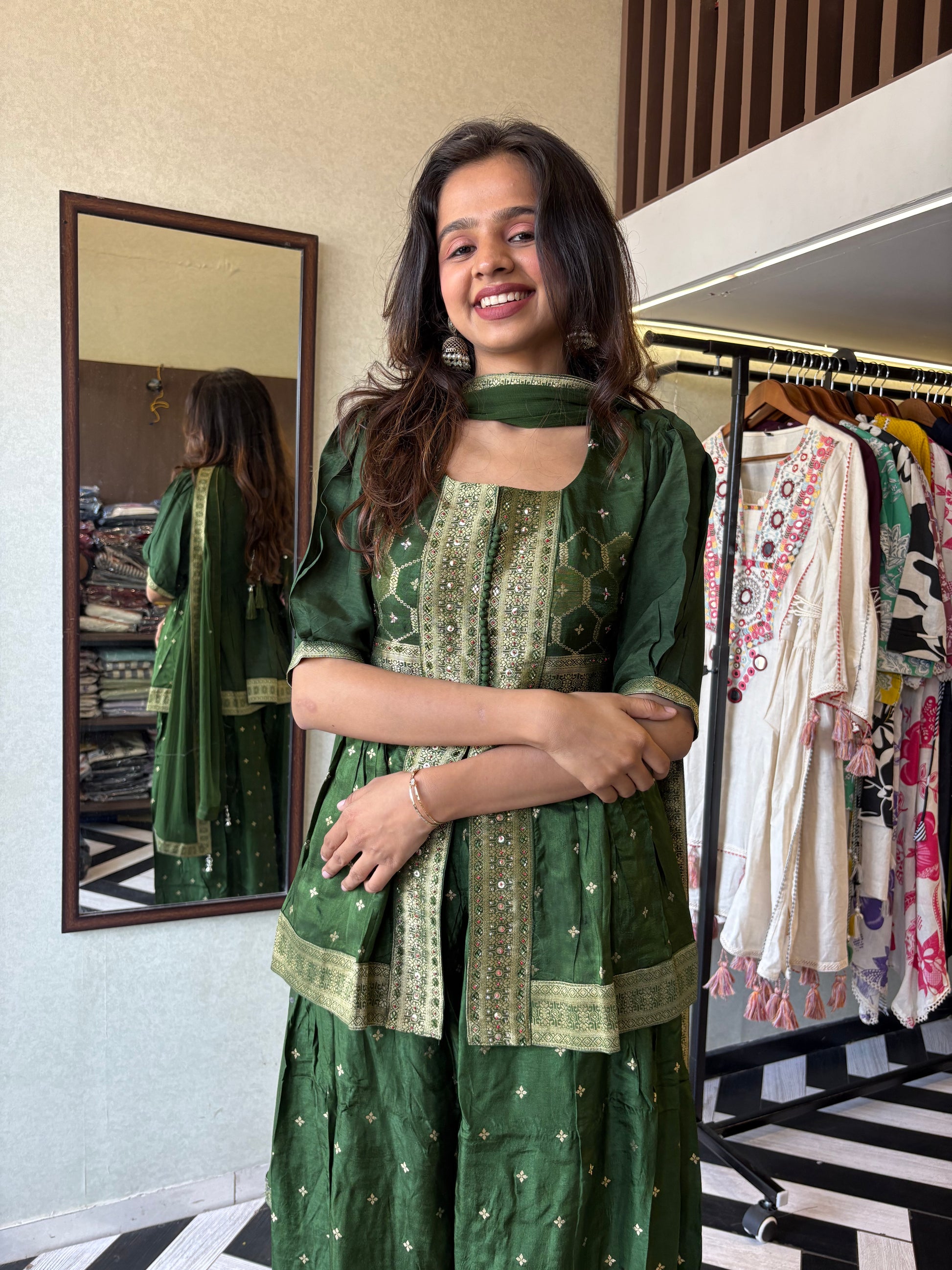 our premium pure silk 3-piece Indo-Western set in stunning green! From dazzling mirror & handwork on the jacket-style top to the flowing plazzo and dupatta