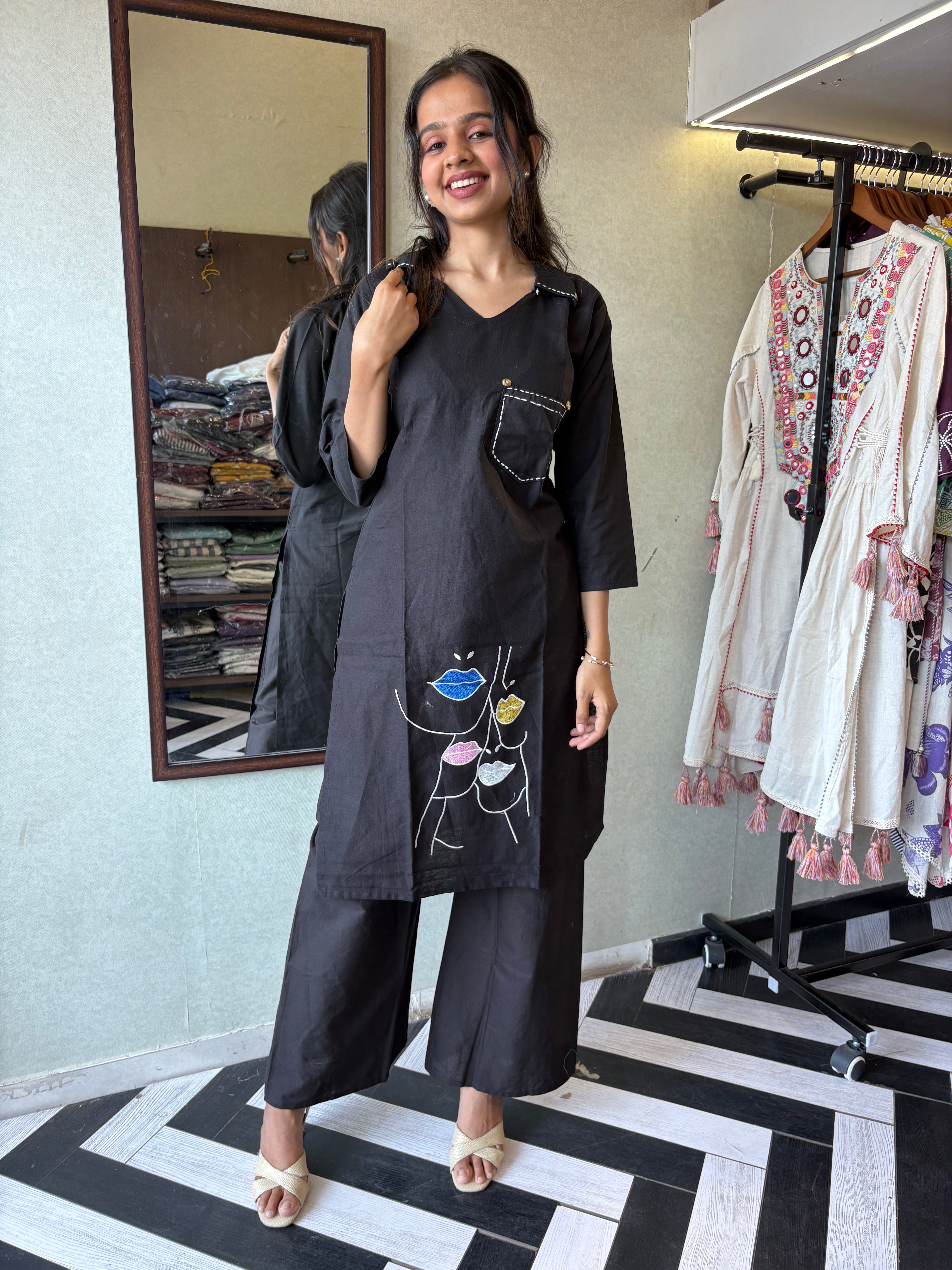 Image of pure cotton black co-ord set, elevated with elegant embroidery detailing. It's a wardrobe must-have that looks premium