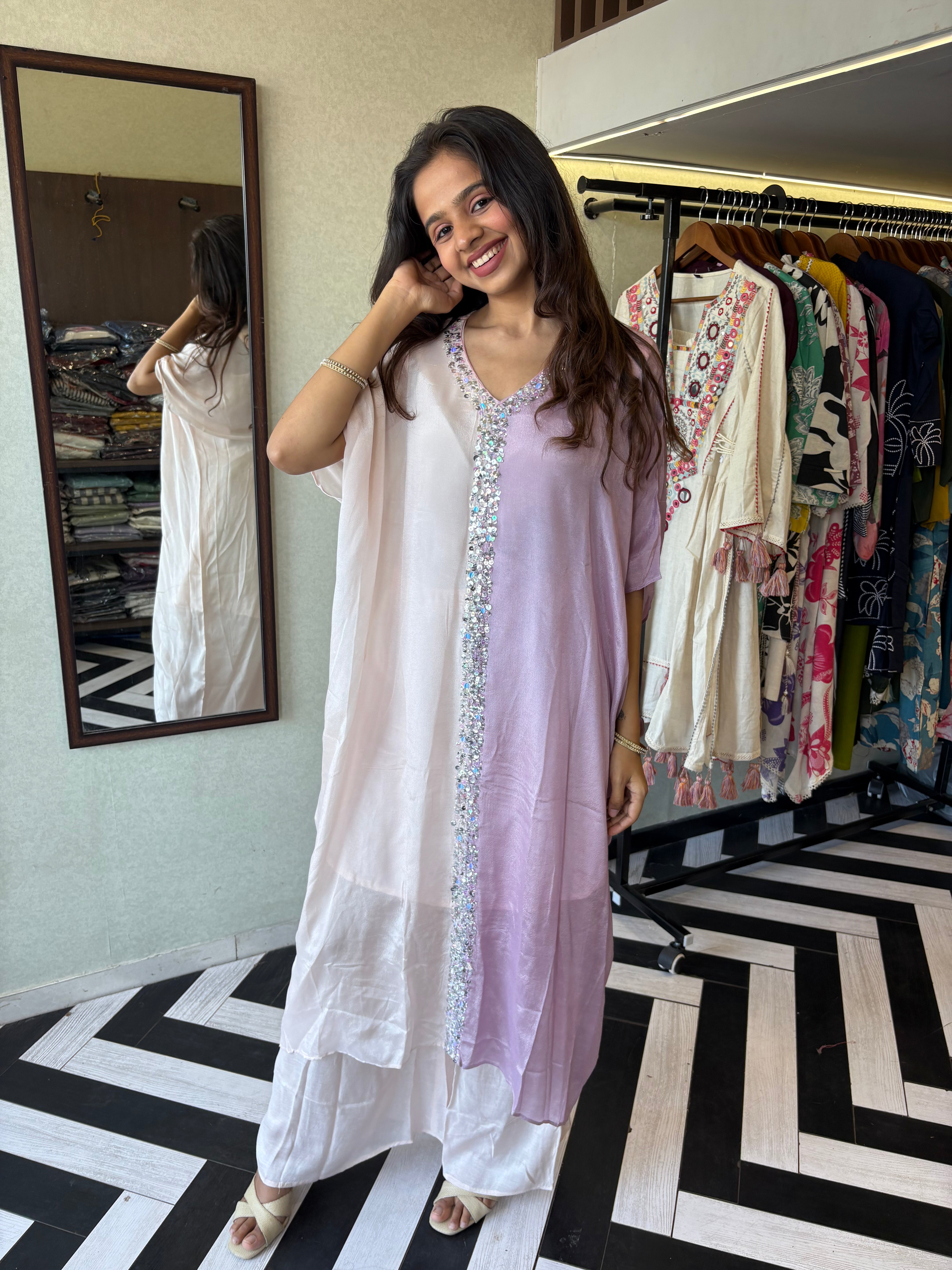 Image of Turn heads in this elegant 3-piece Indo-Western beauty crafted from pure crepe with a silk base - featuring:

Gorgeous double-shade rose color

Center hand-sequence work that glistens with grace