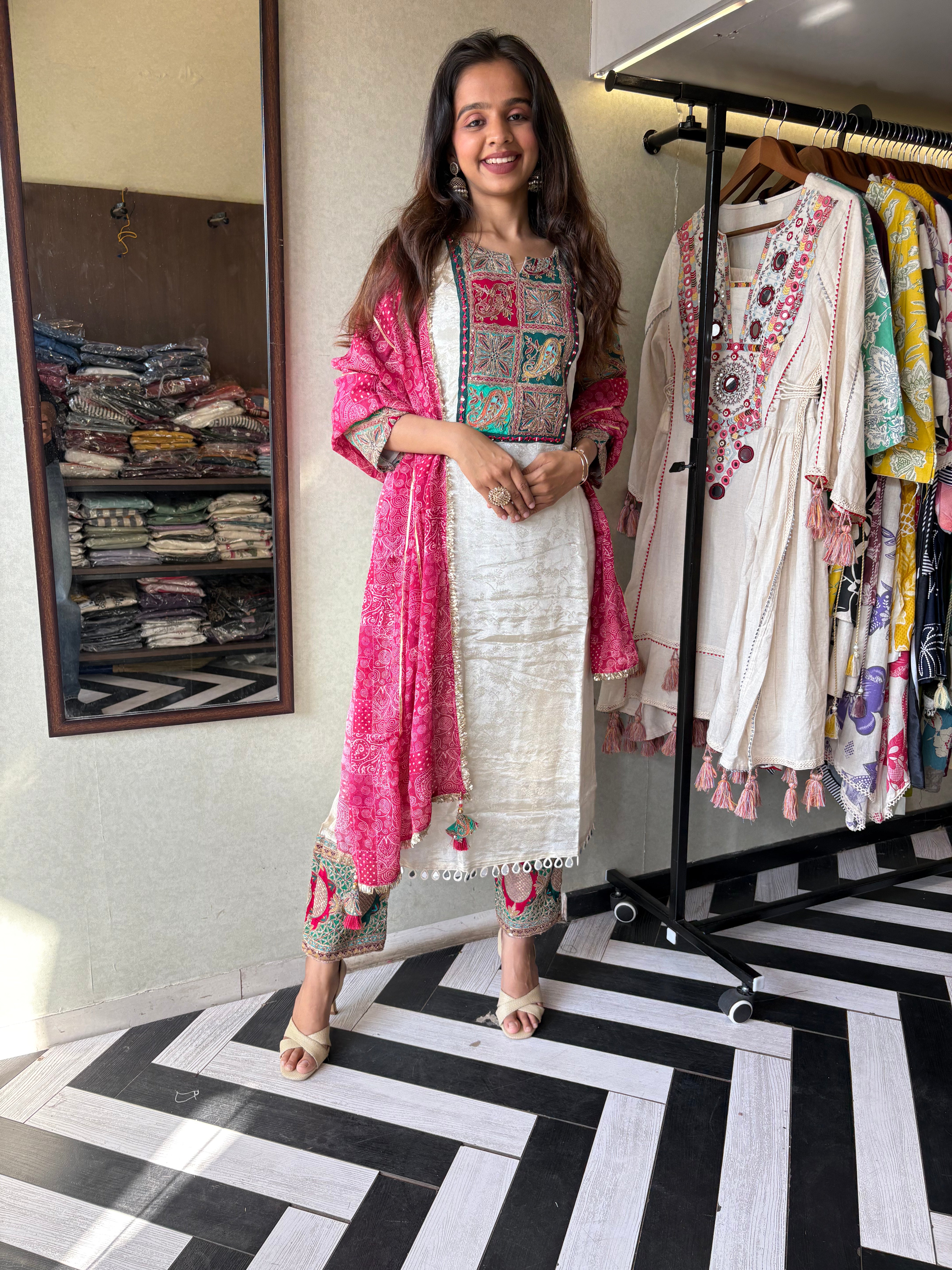 Step into elegance with this Shimmer Kurti Set - featuring weaving detail and pure hand mirror work that brings grace and glam together!