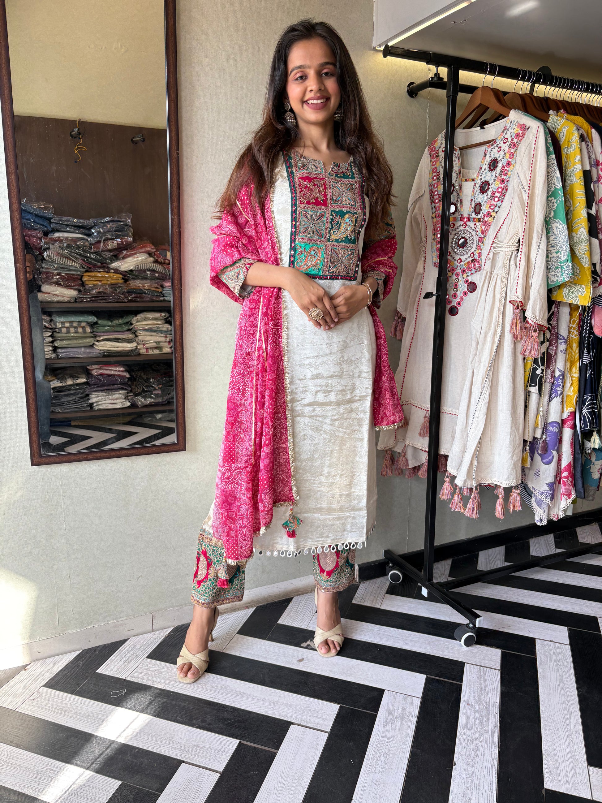 Step into elegance with this Shimmer Kurti Set - featuring weaving detail and pure hand mirror work that brings grace and glam together!