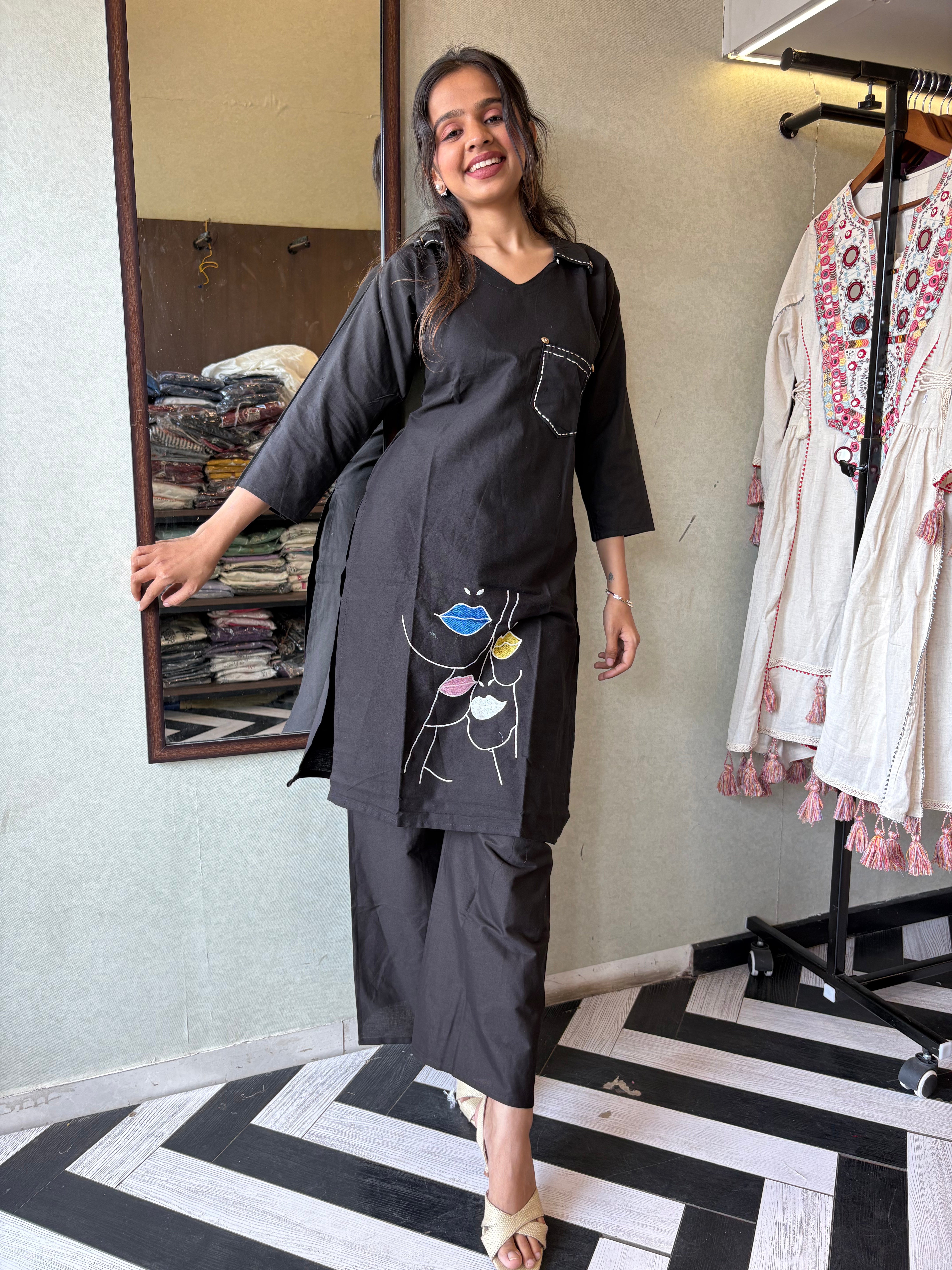 Image of pure cotton black co-ord set, elevated with elegant embroidery detailing. It's a wardrobe must-have that looks premium