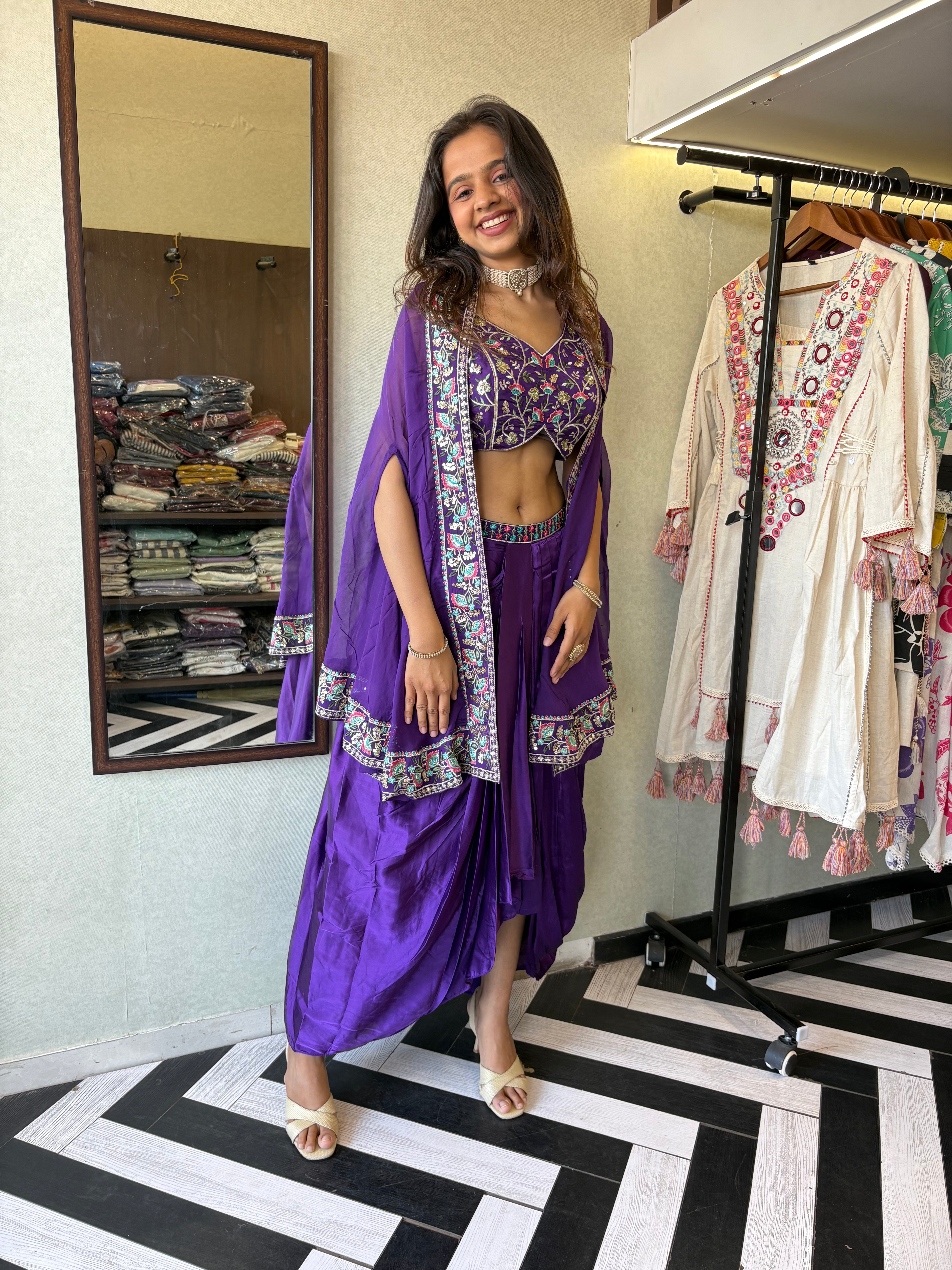 Elegance, Embroidery & the Perfect Drape - All in One Look!

Make your presence unforgettable in this pure crepe purple 3-piece Indo-Western. Full hand embroidery, flawless drape, and designer finishing - this is what statement style looks like