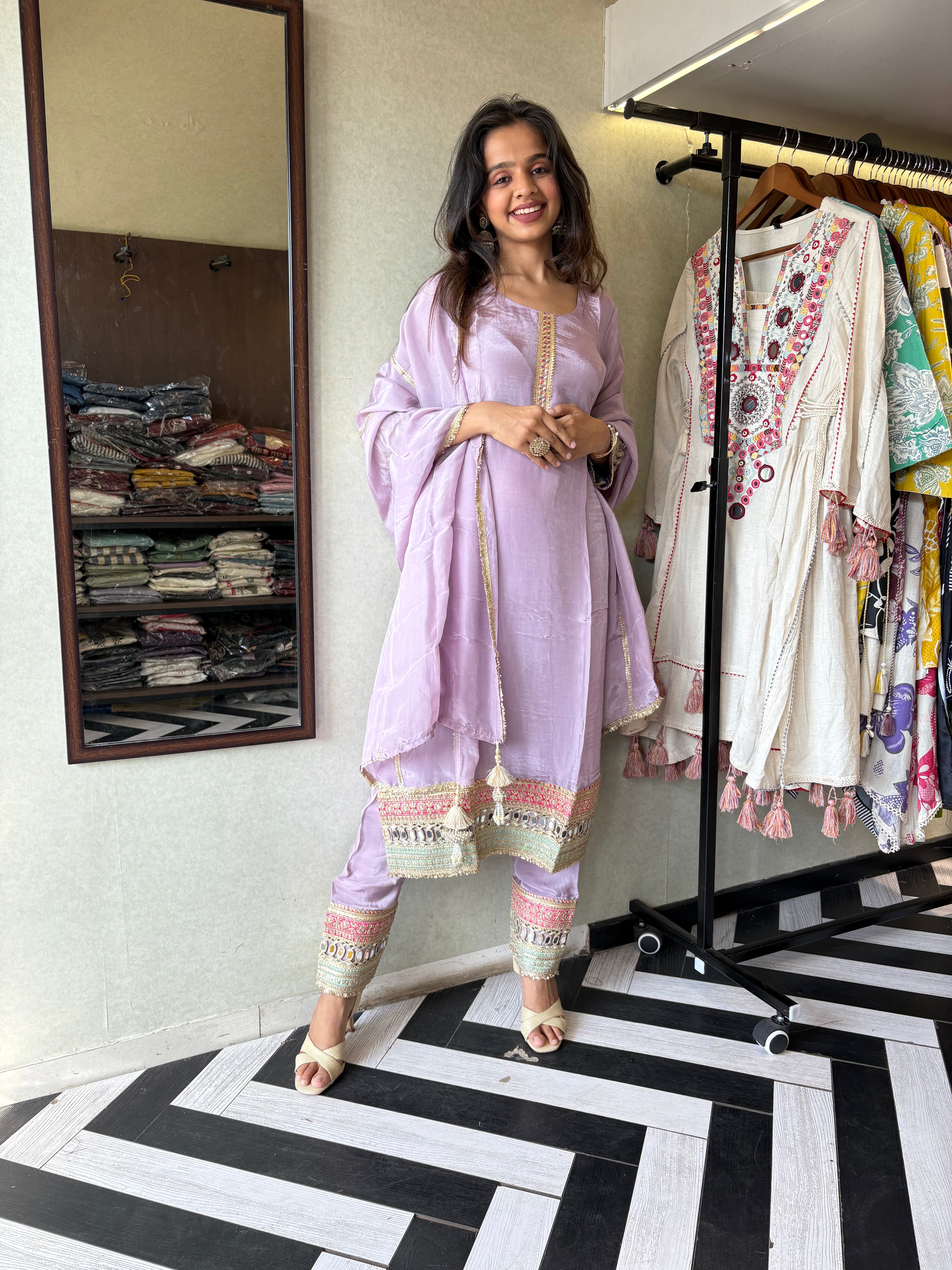 Shine Bright in Royal Magenta!

Crafted in pure silk crepe, this designer straight-cut kurti set is finished with mirror handwork on sleeves and pant ends - a perfect blend of subtle glam and timeless class.