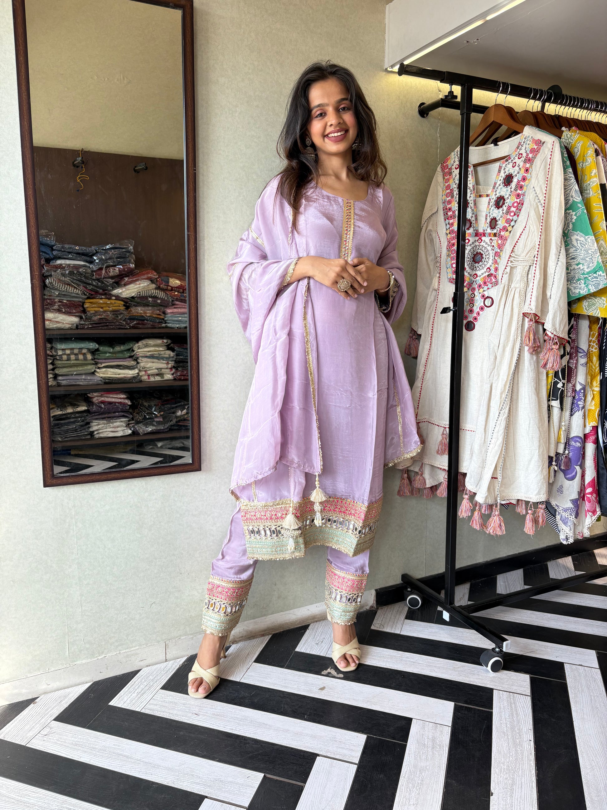 Shine Bright in Royal Magenta!

Crafted in pure silk crepe, this designer straight-cut kurti set is finished with mirror handwork on sleeves and pant ends - a perfect blend of subtle glam and timeless class.