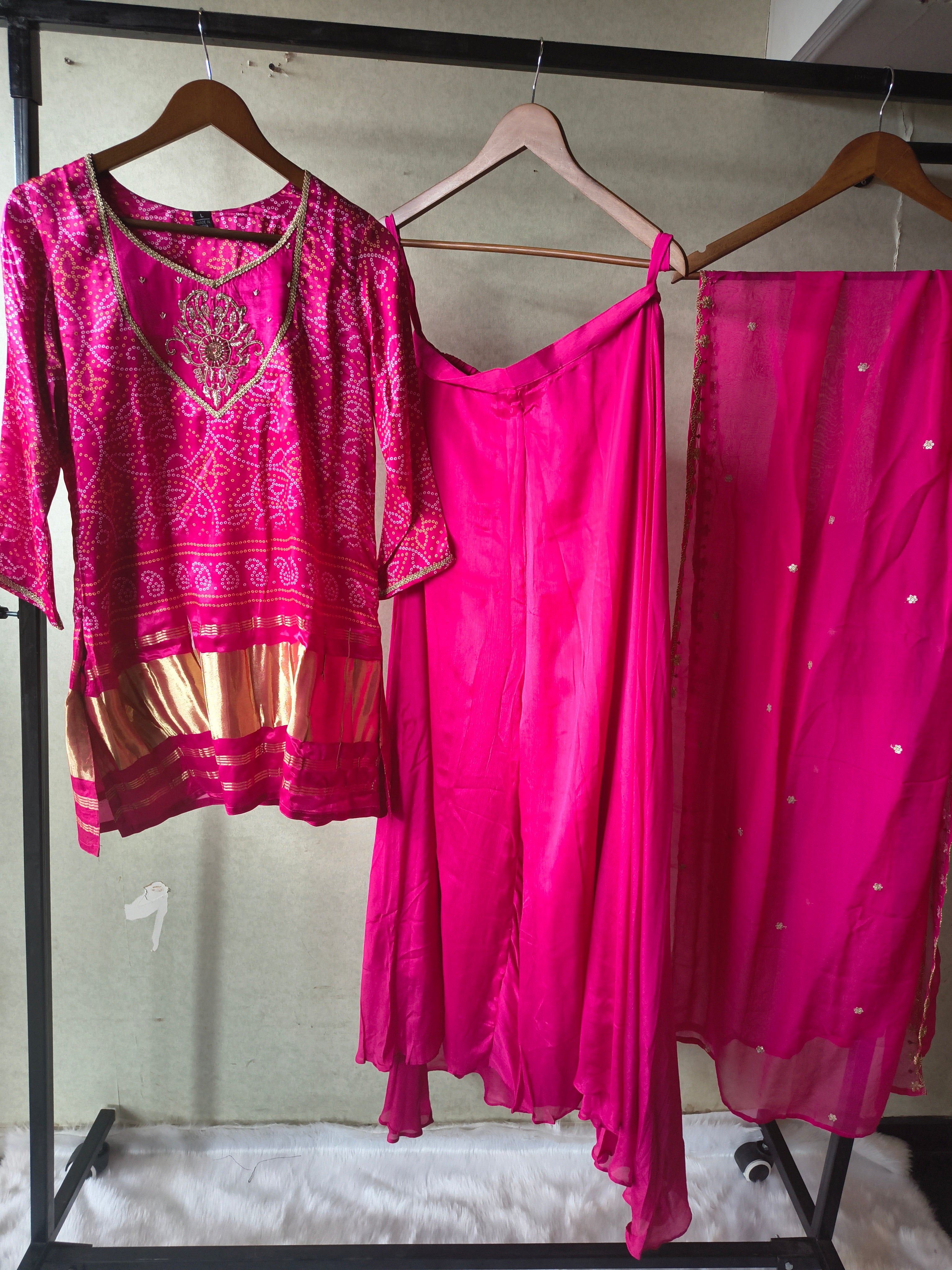 Image of Rani Pink Bandhani Sharara Set with Zari Border & Embroidered Dupatta – Premium 3 Piece Festive Ensemble