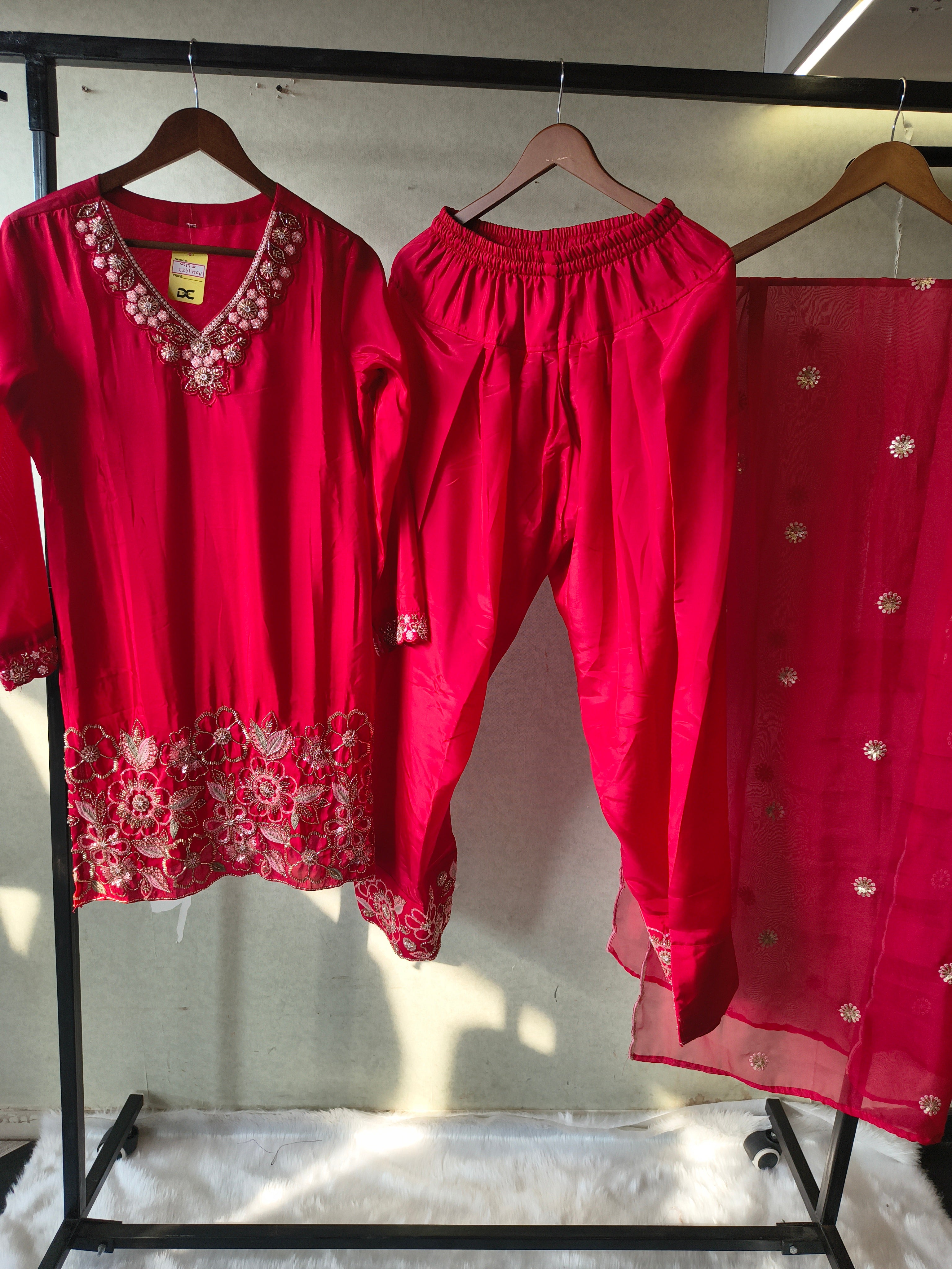 Image of Ruby Red Embroidered Straight Kurta Set with Floral Thread Work, Designer Neckline & Embellished Dupatta – Premium 3 Piece Ethnic Ensemble