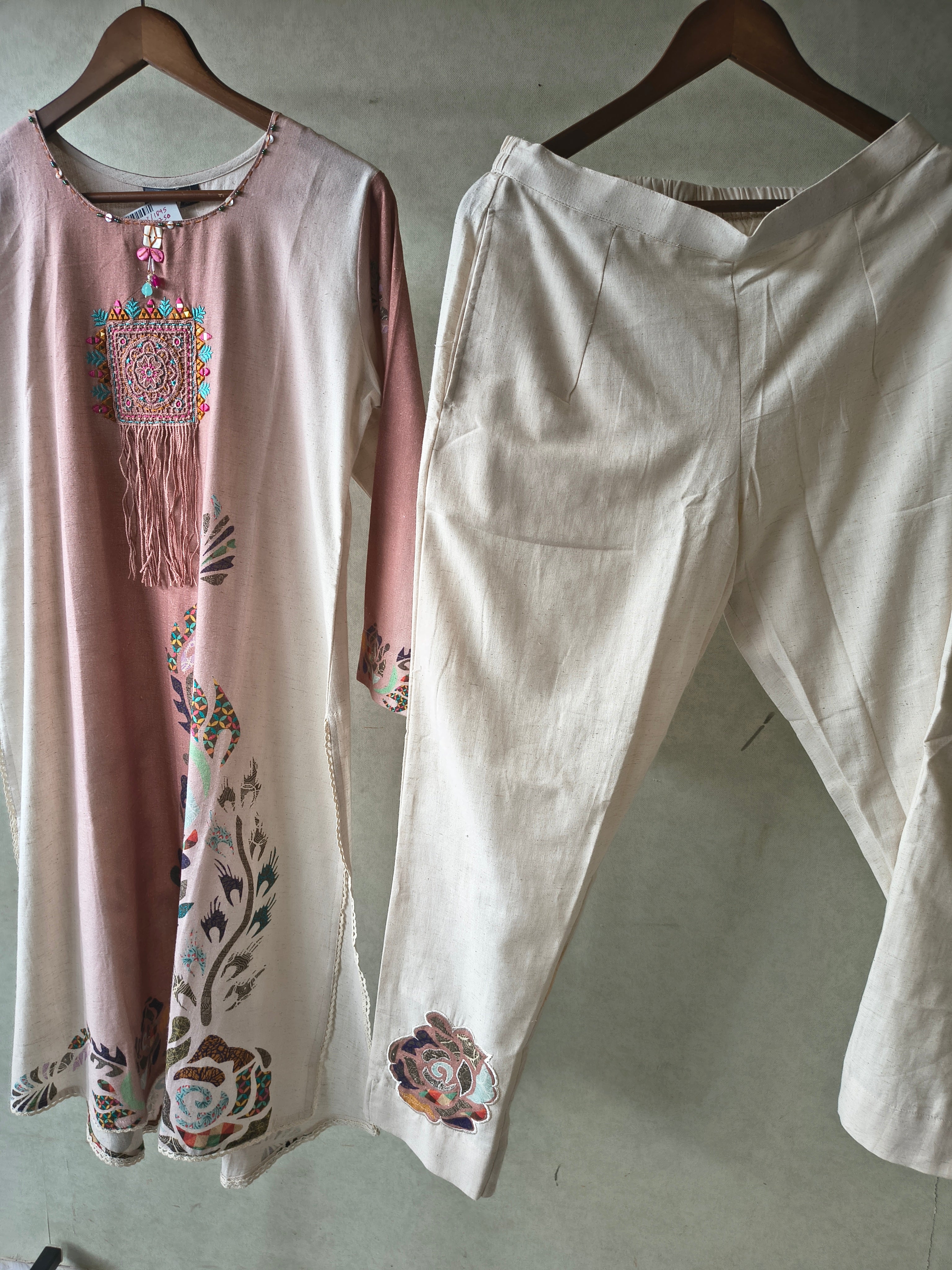 Image of Premium Blush Pink Linen Blend Kurta Set with Handcrafted Embroidered Tassel Patch & Embroidered Pants