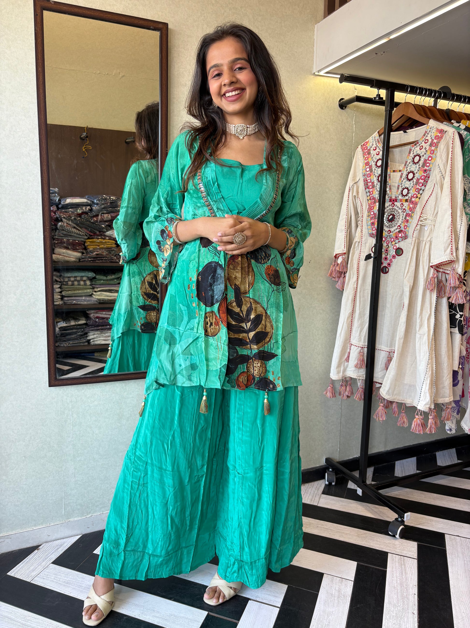 Step into the celebration with our Designer Crepe 2-Piece Set in a refreshing green hue, crafted with intricate detailing and effortless grace