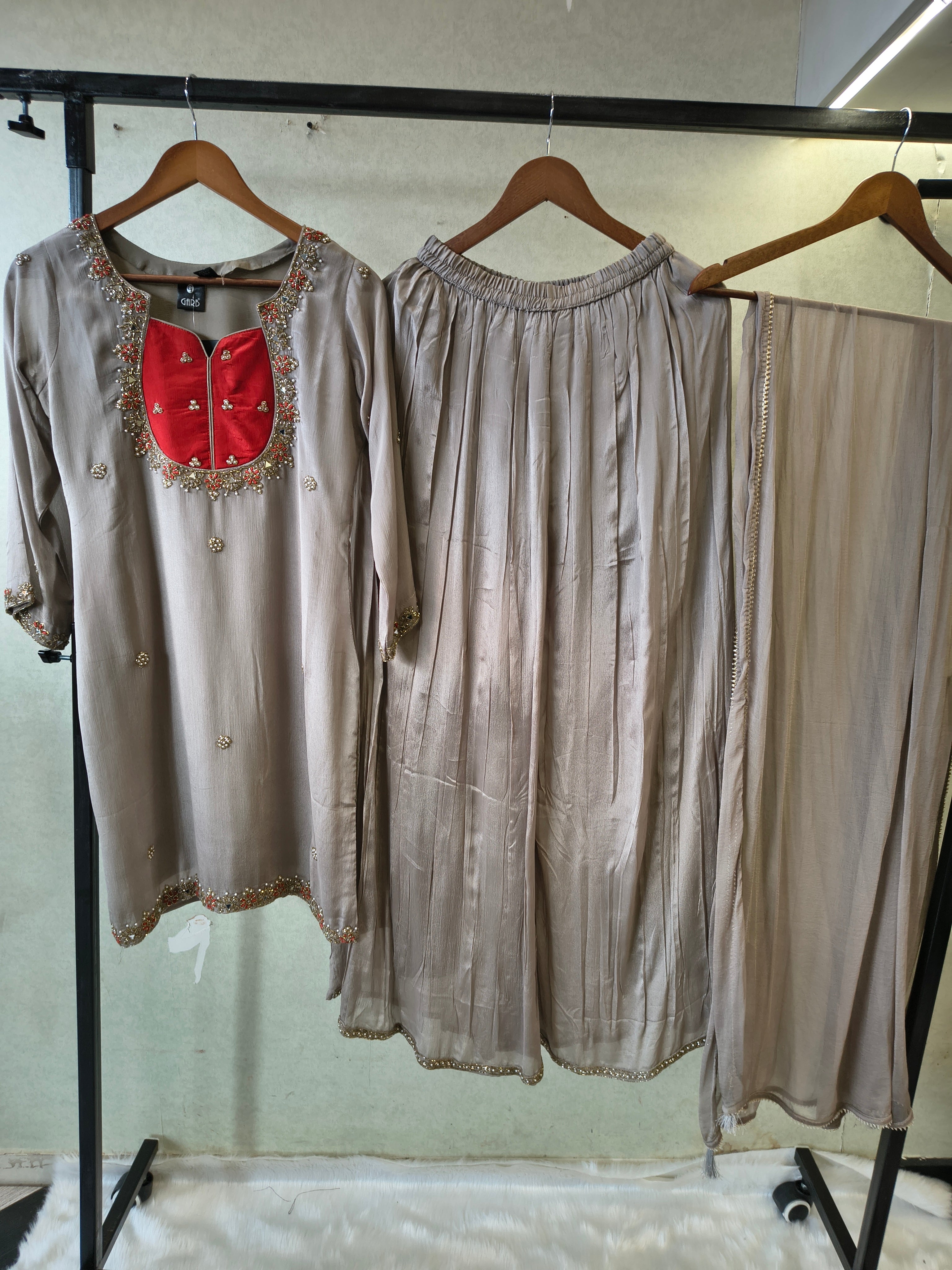 Image of Pearl Grey Embellished Straight Kurta Set with Handcrafted Neckline, Wide Palazzo & Chiffon Dupatta | Premium 3 Piece Festive Ensemble