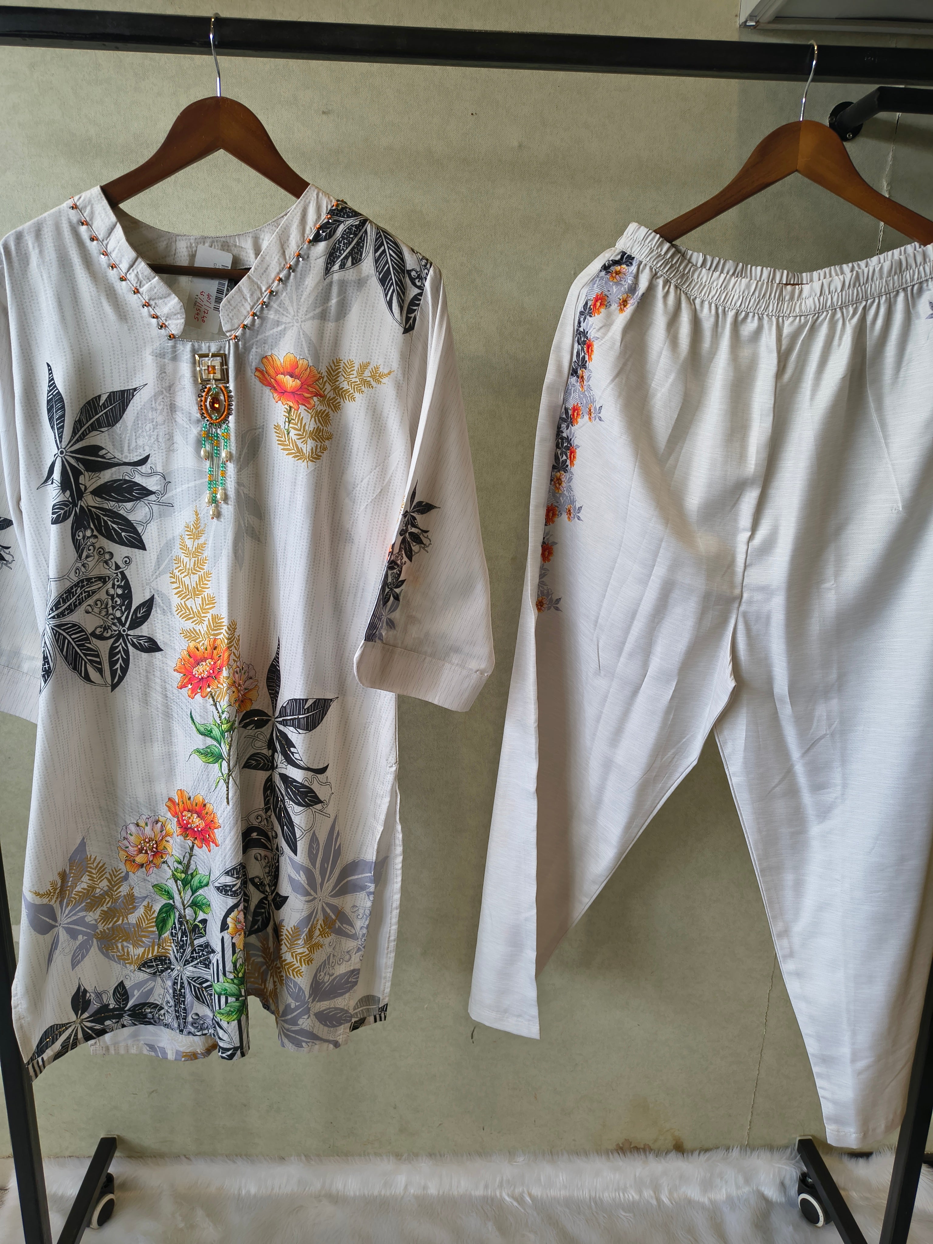 Image of Premium Ivory Botanical Printed Kurta Set with Designer Pendant Neckline