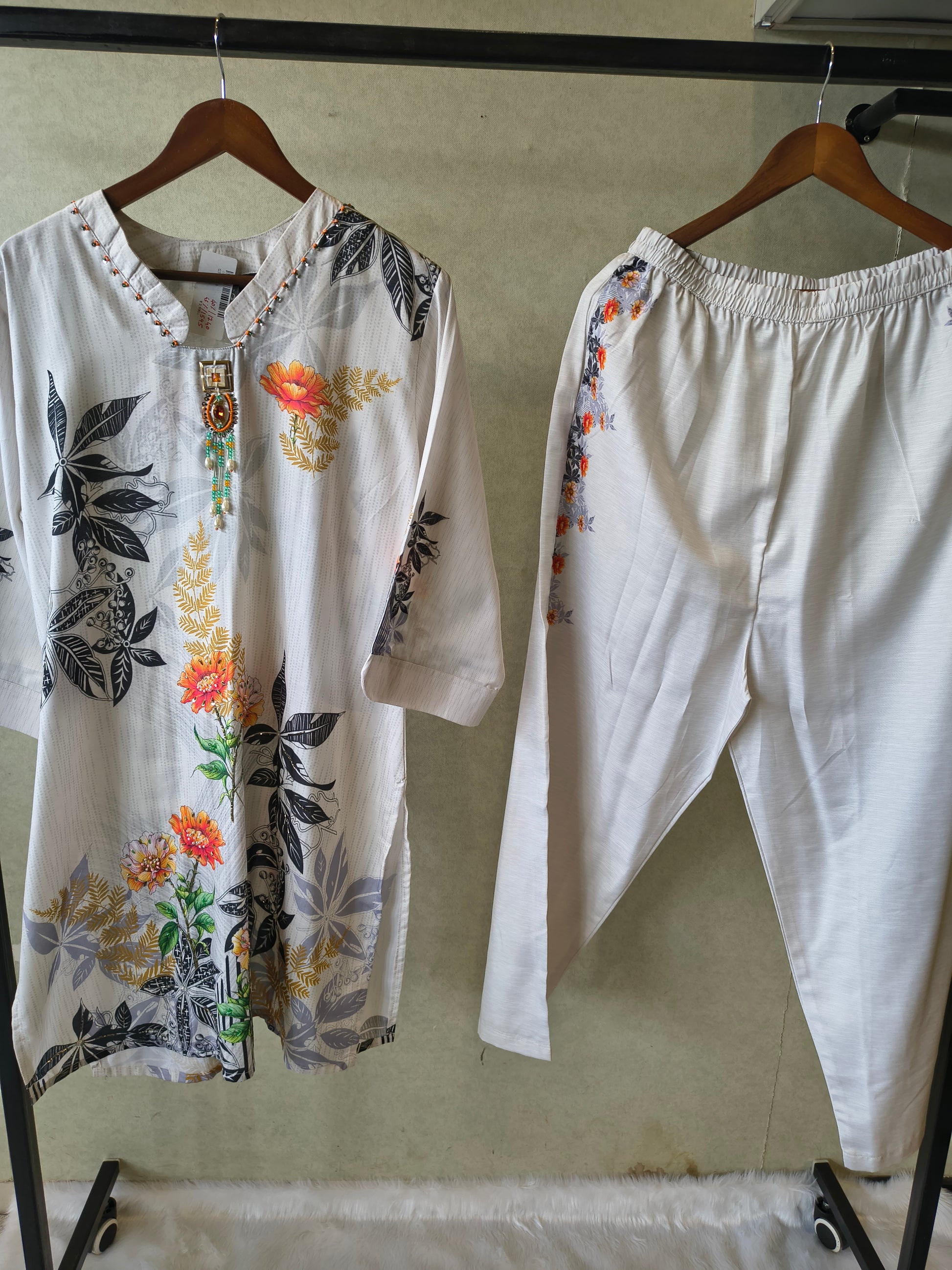 Premium Ivory Botanical Printed Kurta Set with Designer Pendant Neckline