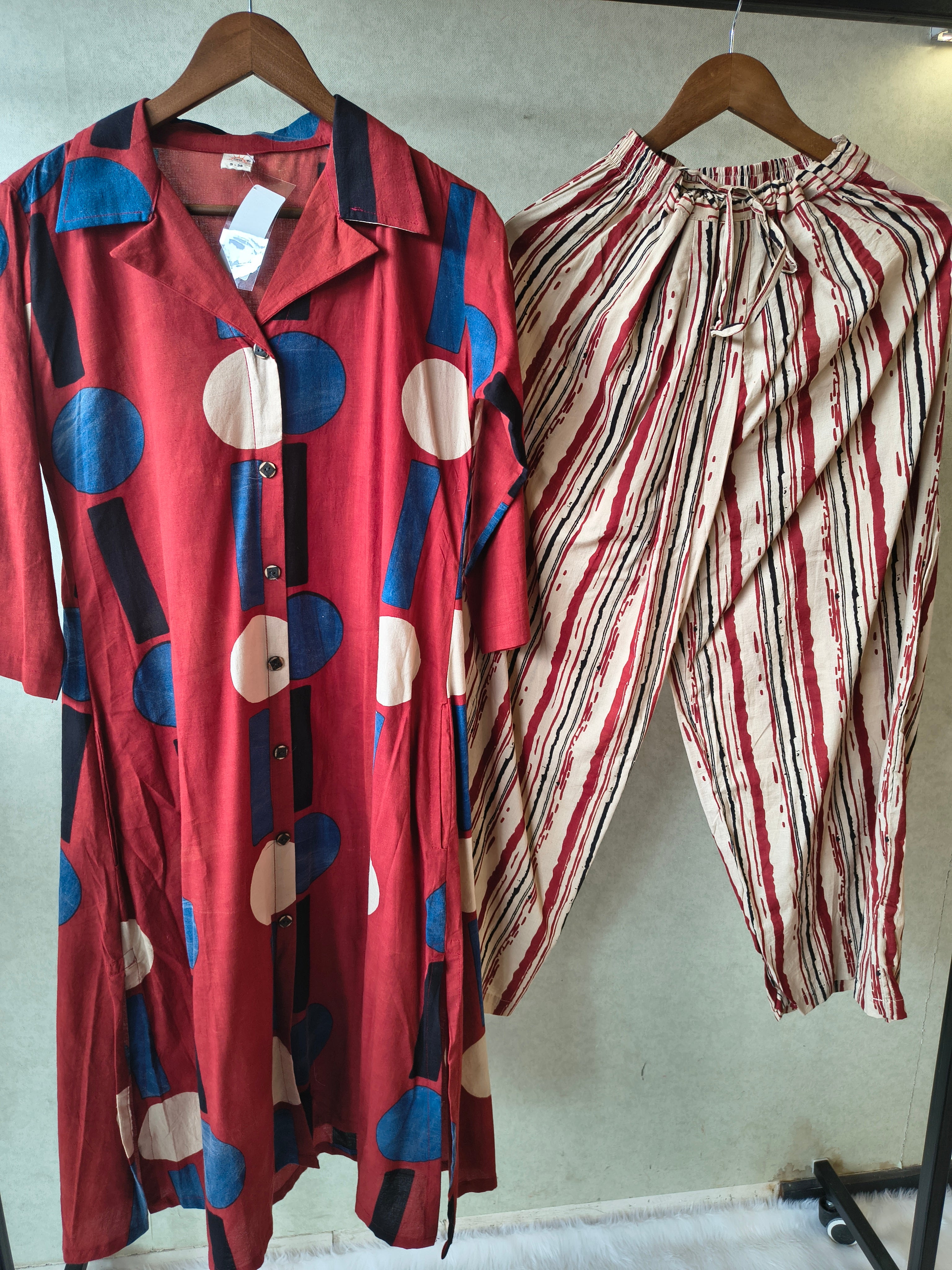 Image of Premium Rust Red Abstract Printed Shirt Kurta with Striped Relaxed Pants Co-Ord Set
