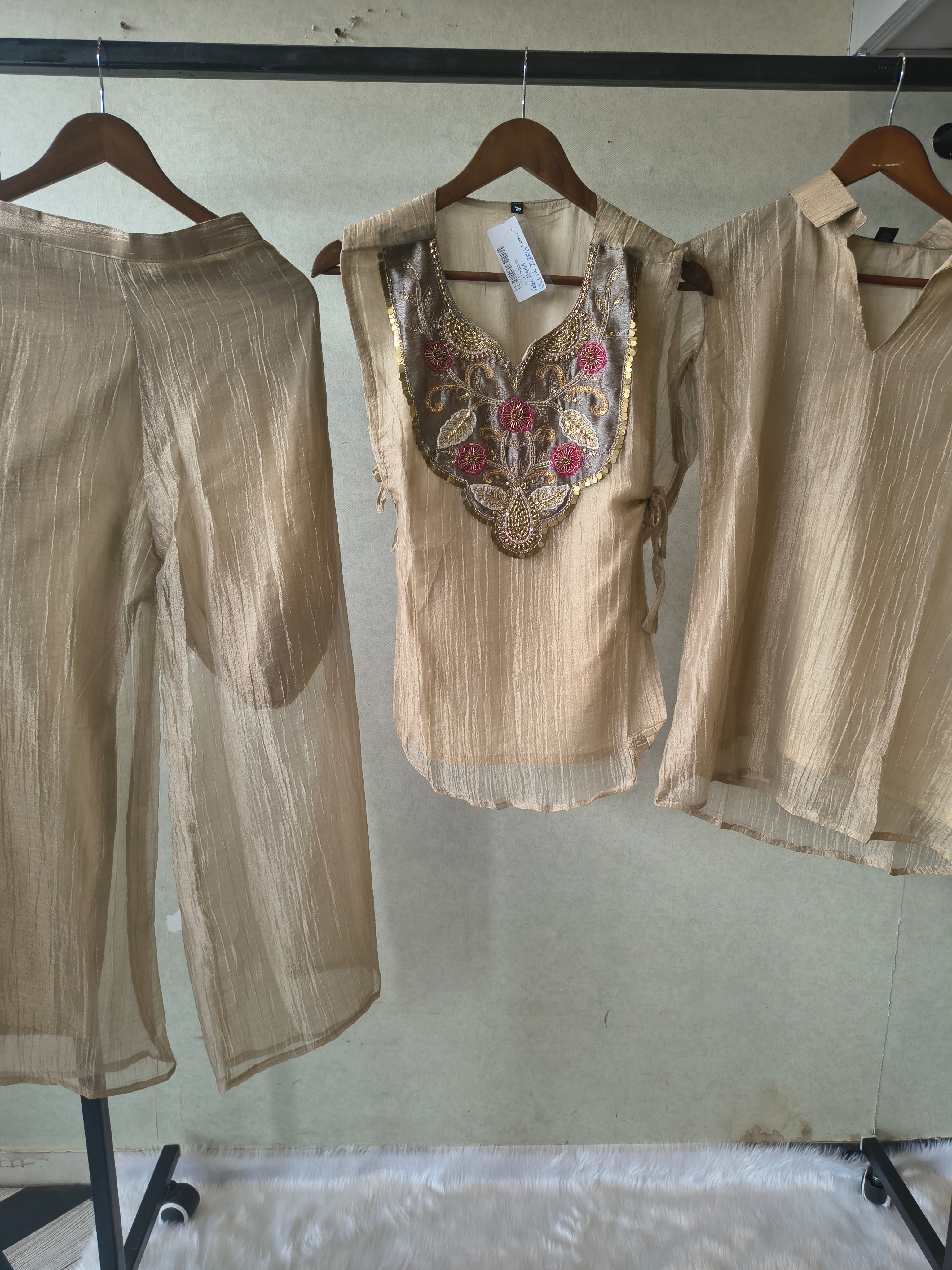 Image of Premium Champagne Tissue Silk Embroidered Kurta with Hand Embellished Statement Yoke