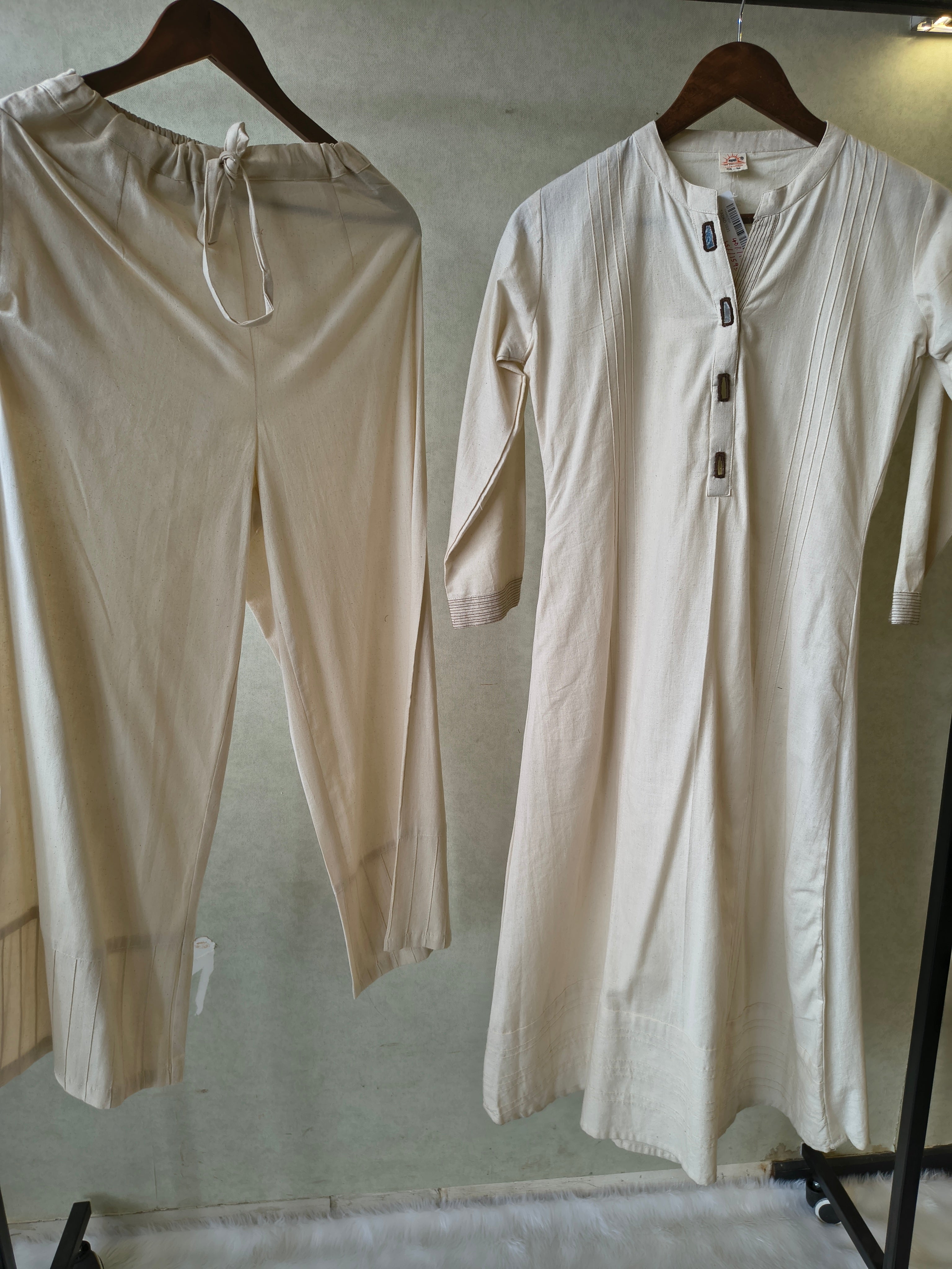 Image of Premium Off-White Cotton A-Line Kurta & Pant Co-Ord Set with Pintuck Detailing