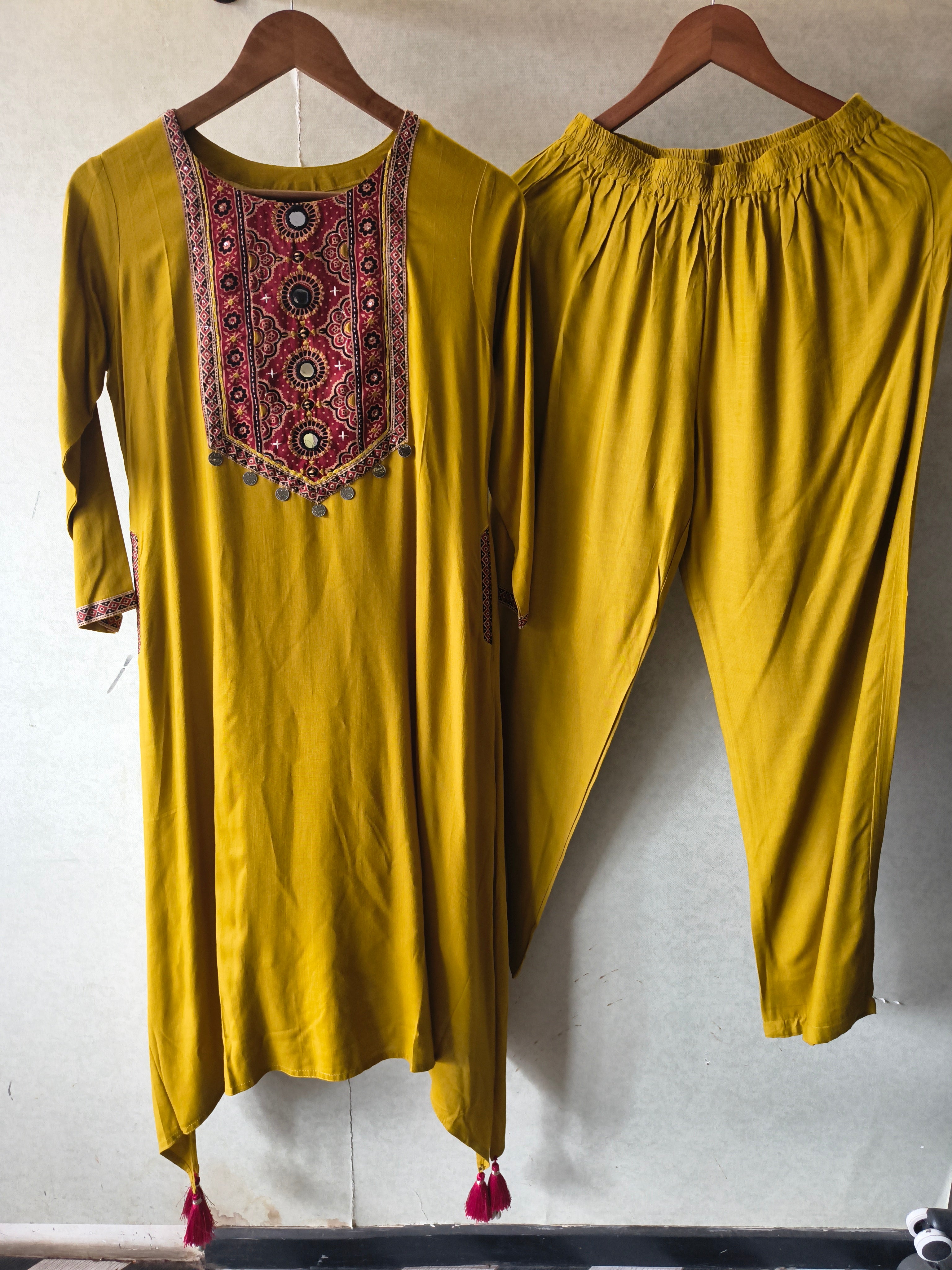Image of Premium Mustard Ethnic Printed Yoke Kurta Pant Co-Ord Set with Tassel Hem