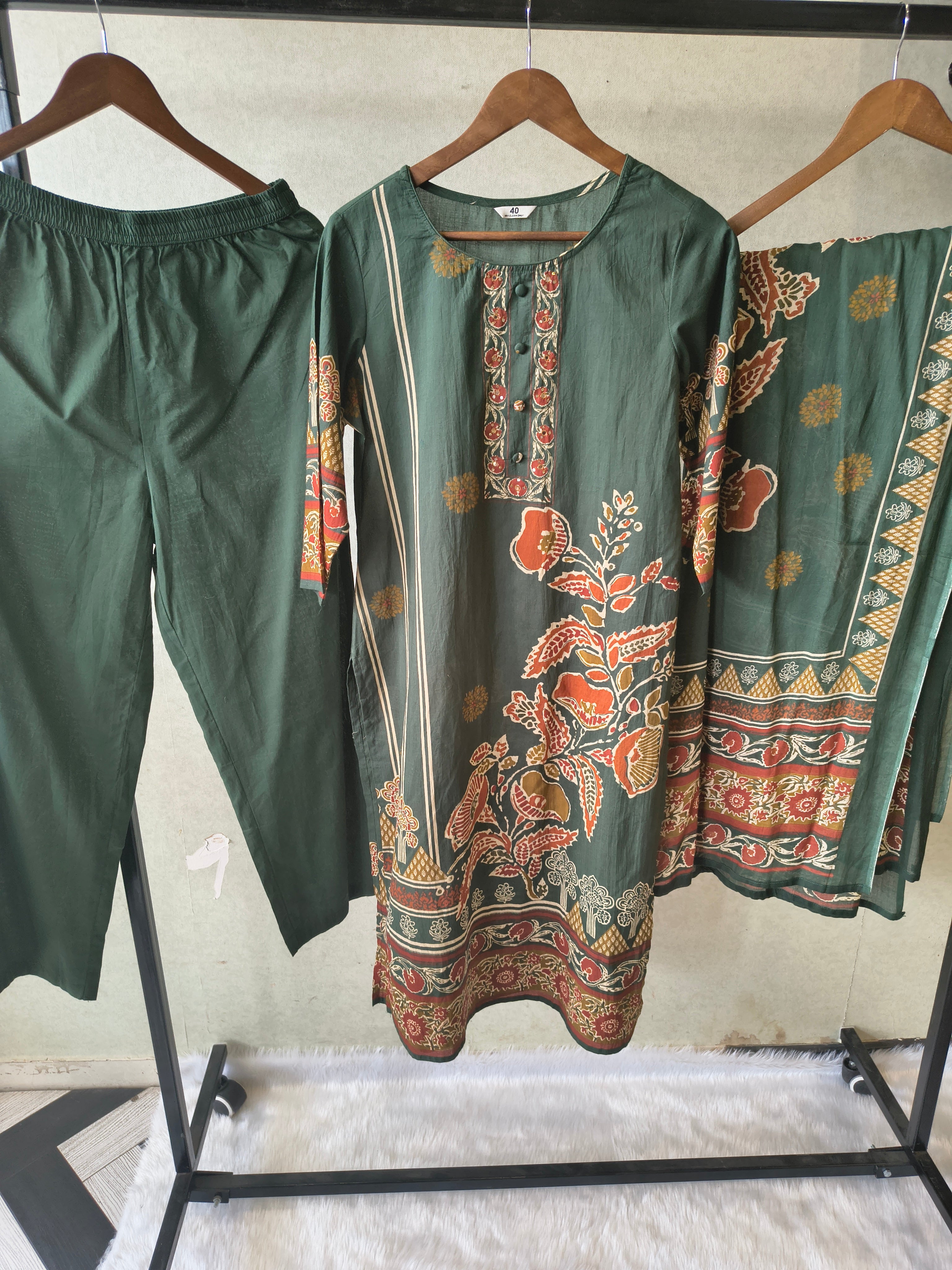 Image of Emerald Green Floral Printed Three-Piece Cotton Kurta Set with Dupatta
