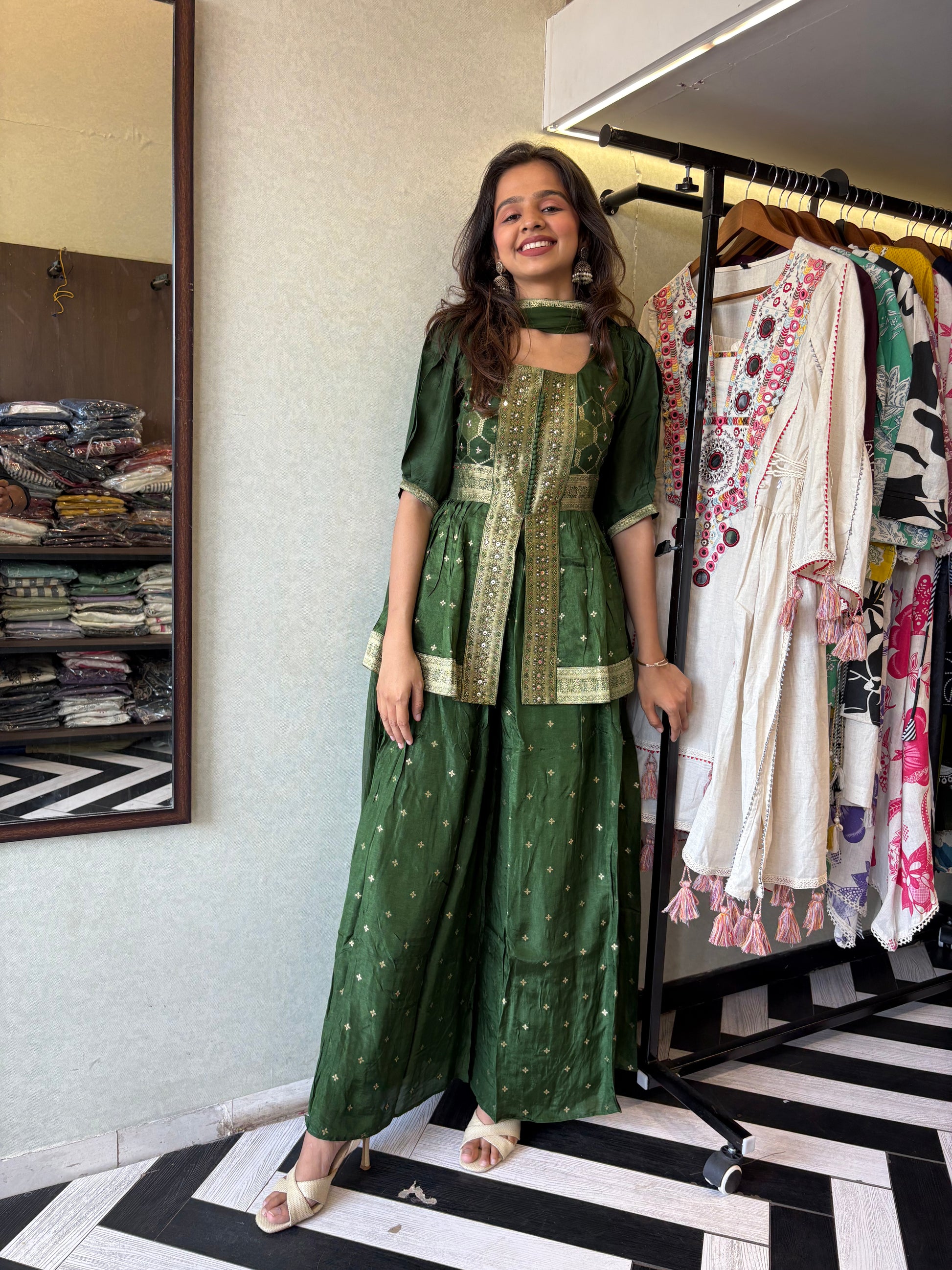 our premium pure silk 3-piece Indo-Western set in stunning green! From dazzling mirror & handwork on the jacket-style top to the flowing plazzo and dupatta