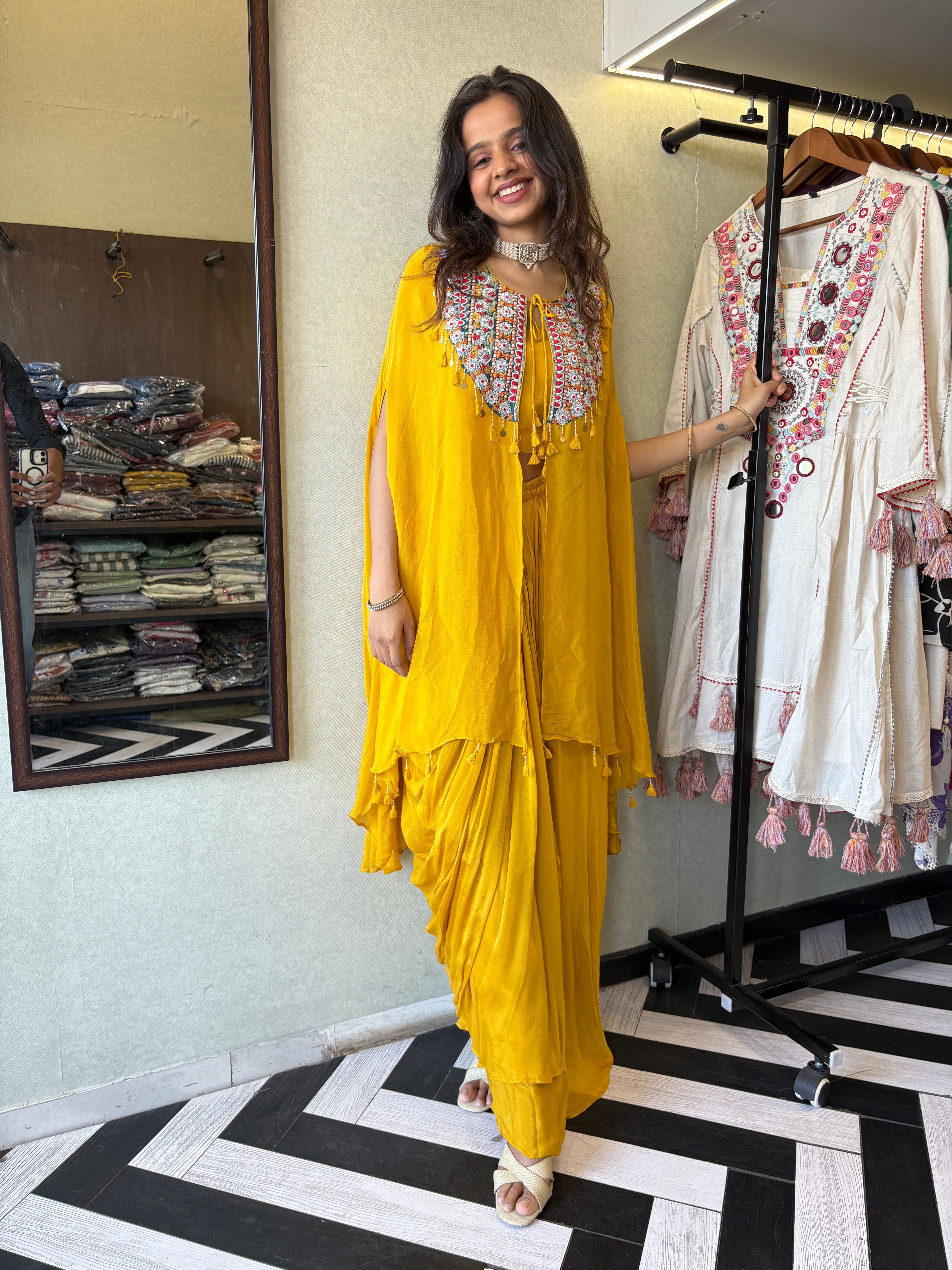Image of Step into the spotlight with our stunning yellow pure georgette Indo-Western 2-piece. Designed with intricate handwork and full sequin craftsmanship, this piece delivers pure elegance for those who love to shine bright