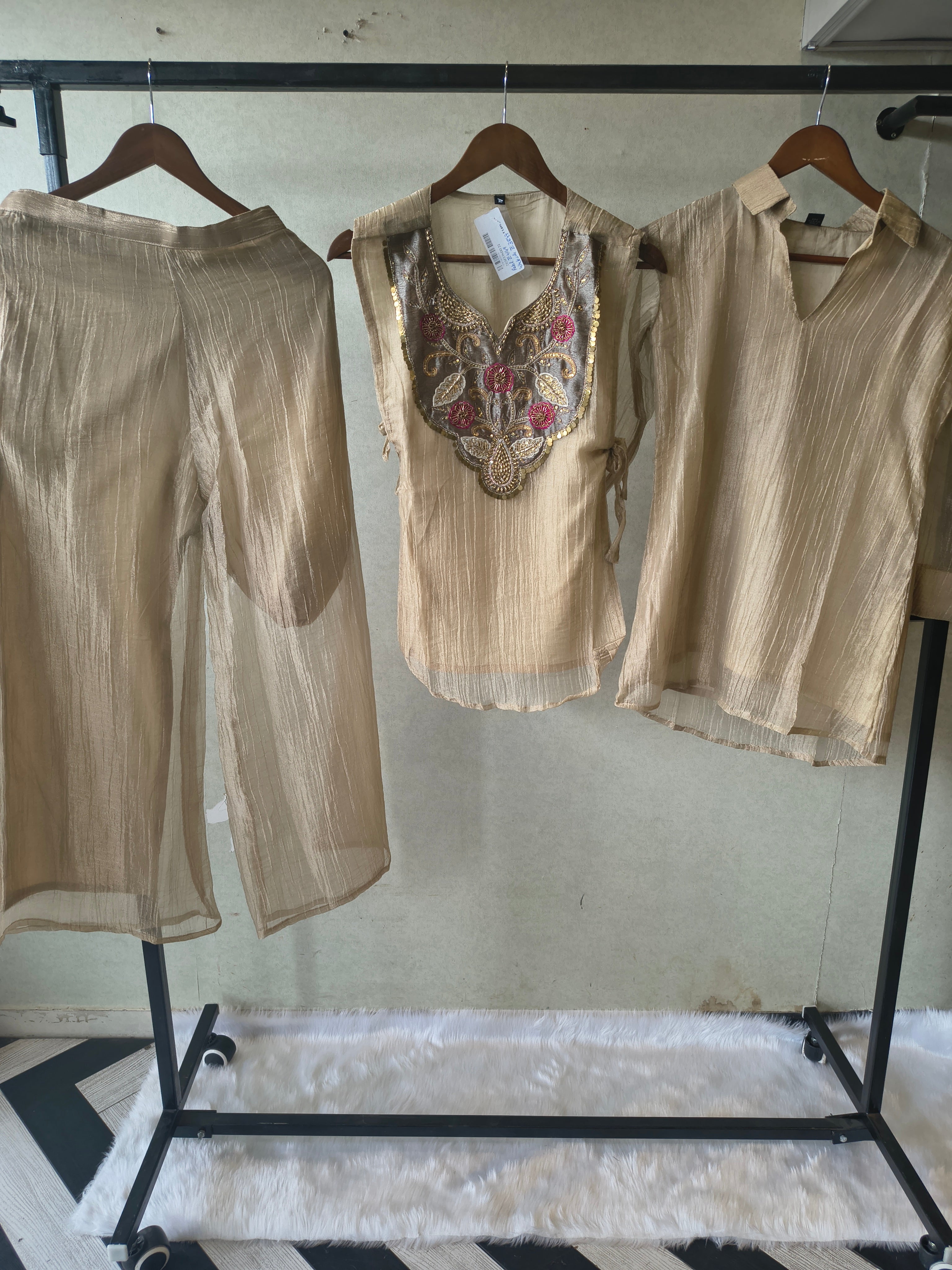 Image of Premium Champagne Tissue Silk Embroidered Kurta with Hand Embellished Statement Yoke