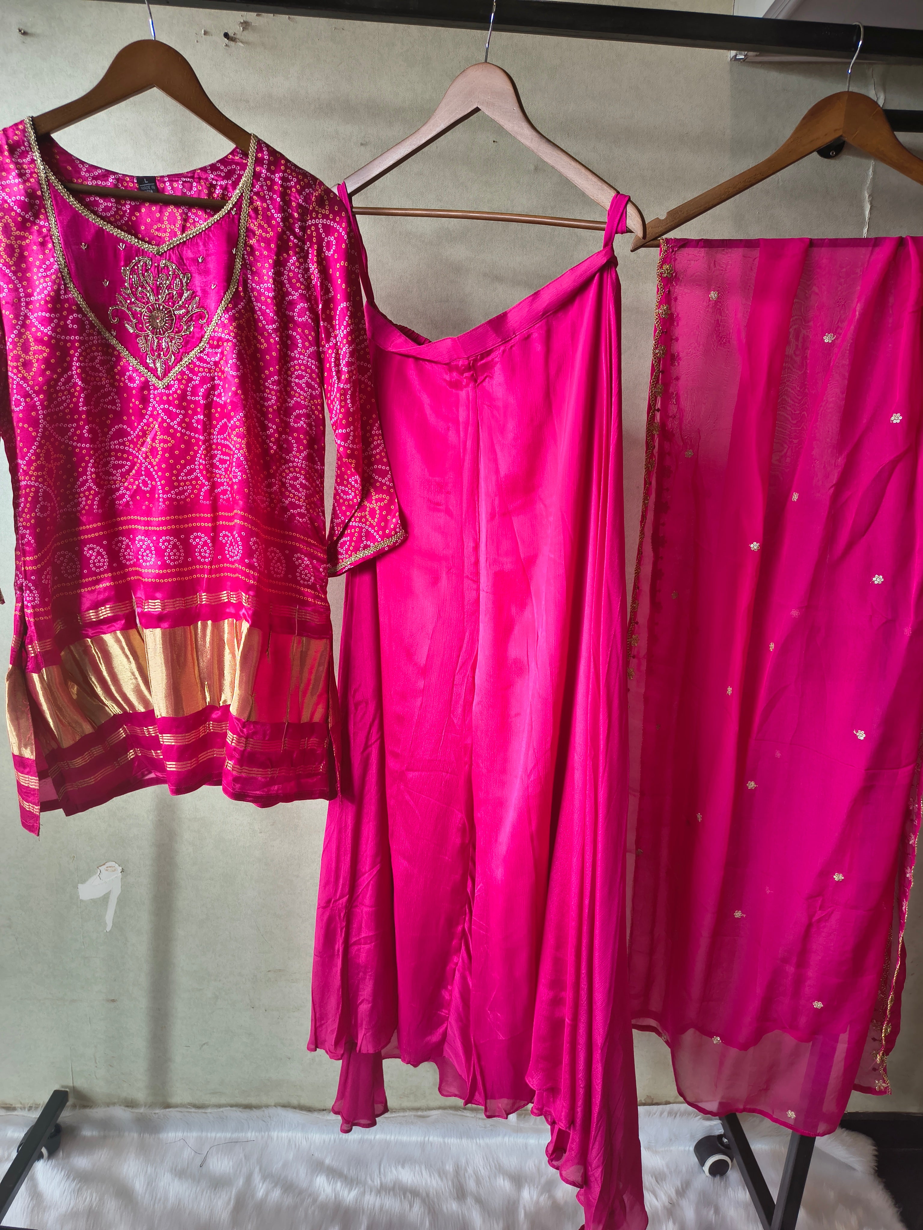 Image of Rani Pink Bandhani Sharara Set with Zari Border & Embroidered Dupatta – Premium 3 Piece Festive Ensemble