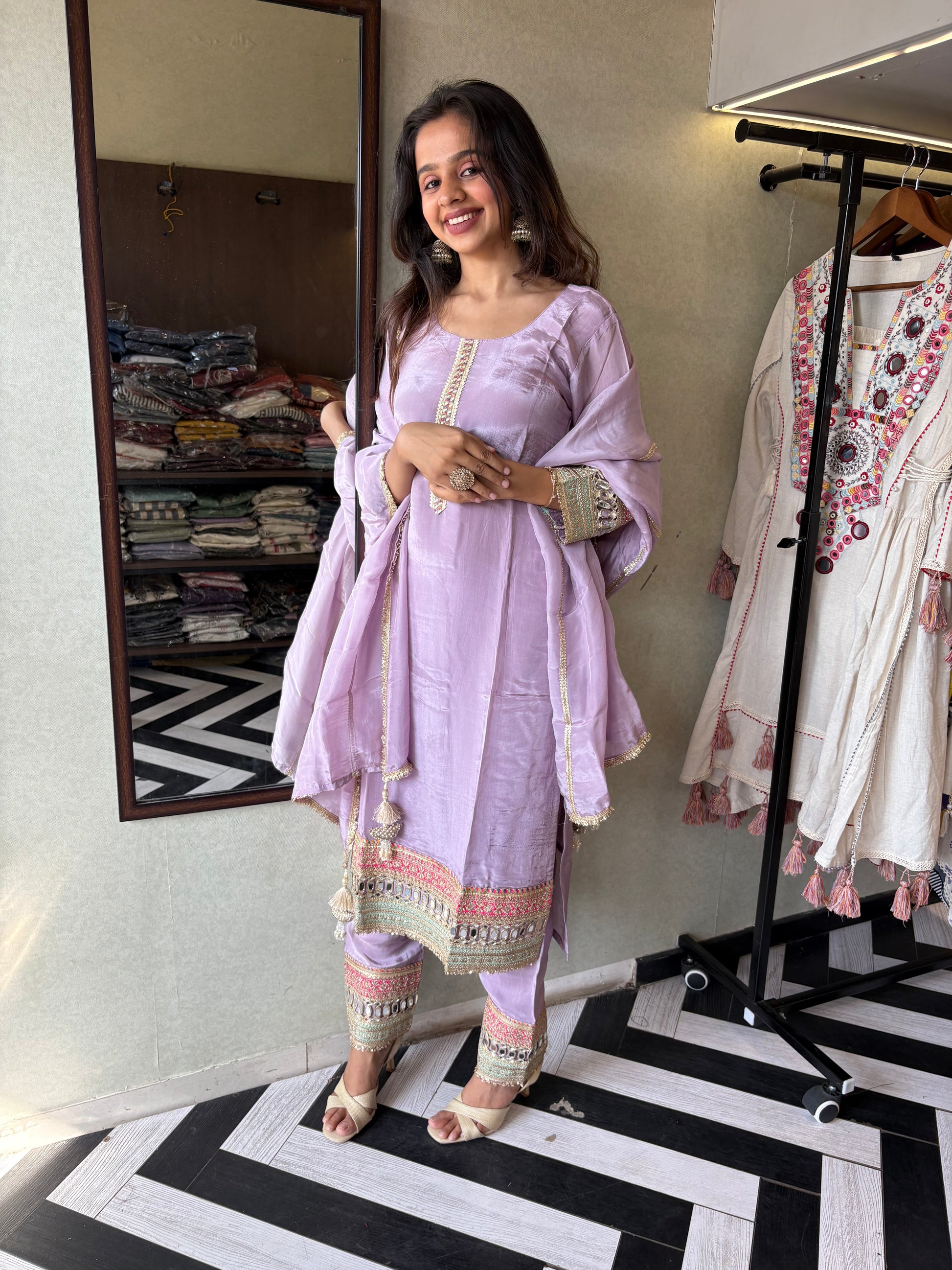 Shine Bright in Royal Magenta!

Crafted in pure silk crepe, this designer straight-cut kurti set is finished with mirror handwork on sleeves and pant ends - a perfect blend of subtle glam and timeless class.