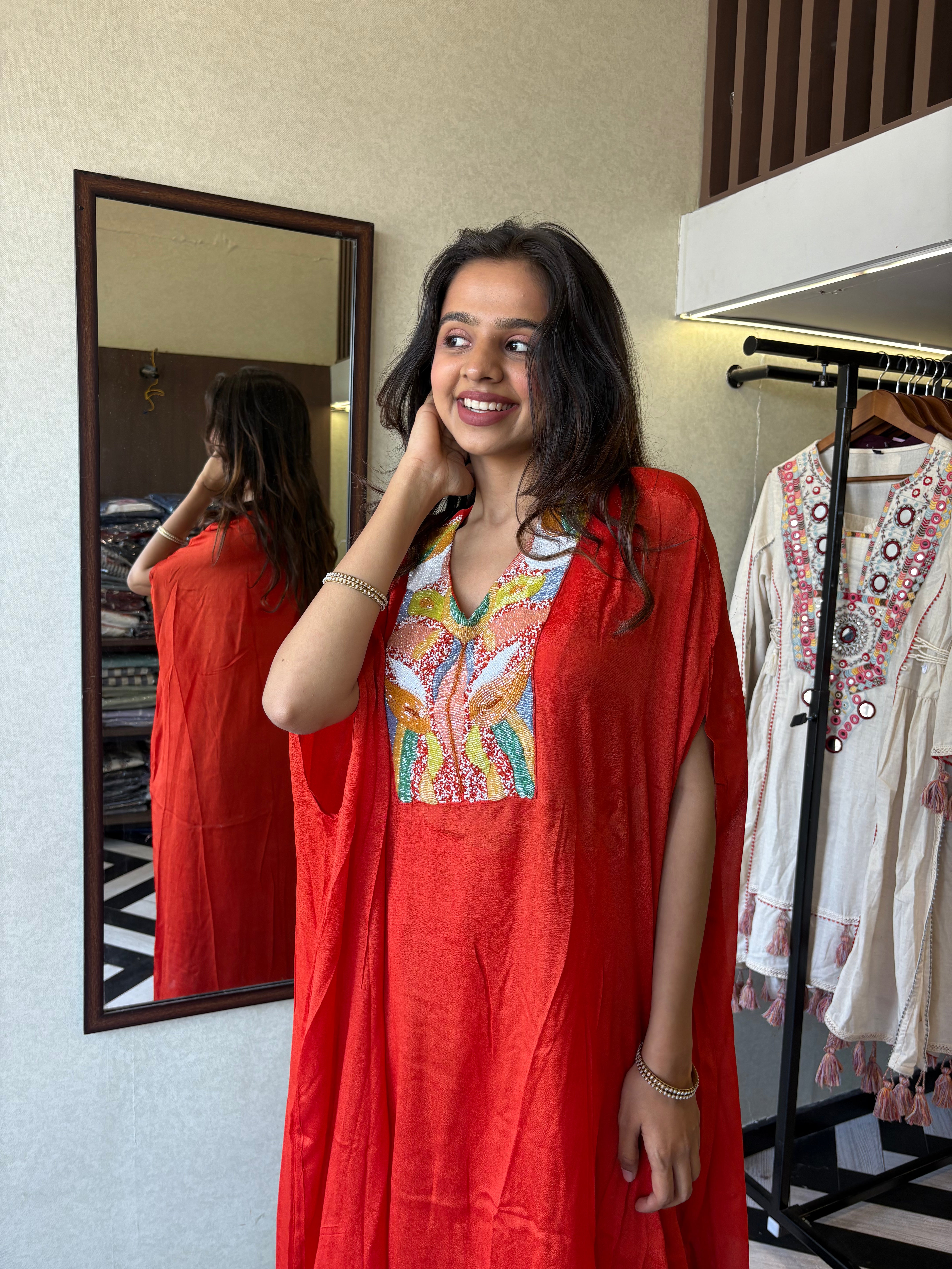 Image of Step into the spotlight in this premium 2-piece Indo-Western set in a breathtaking orange rust hue.