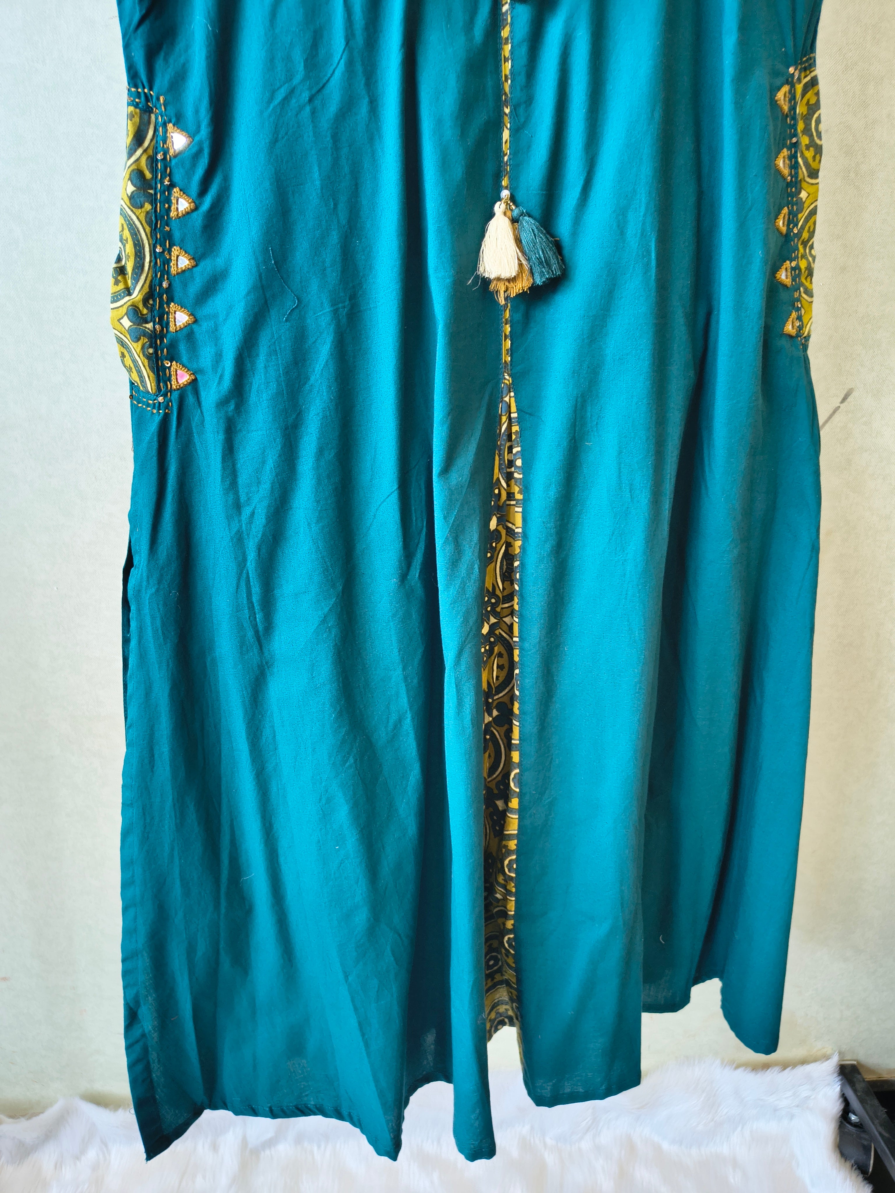 Image of Teal Sleeveless A-Line Kurta Set with Printed Panel & Straight Pants