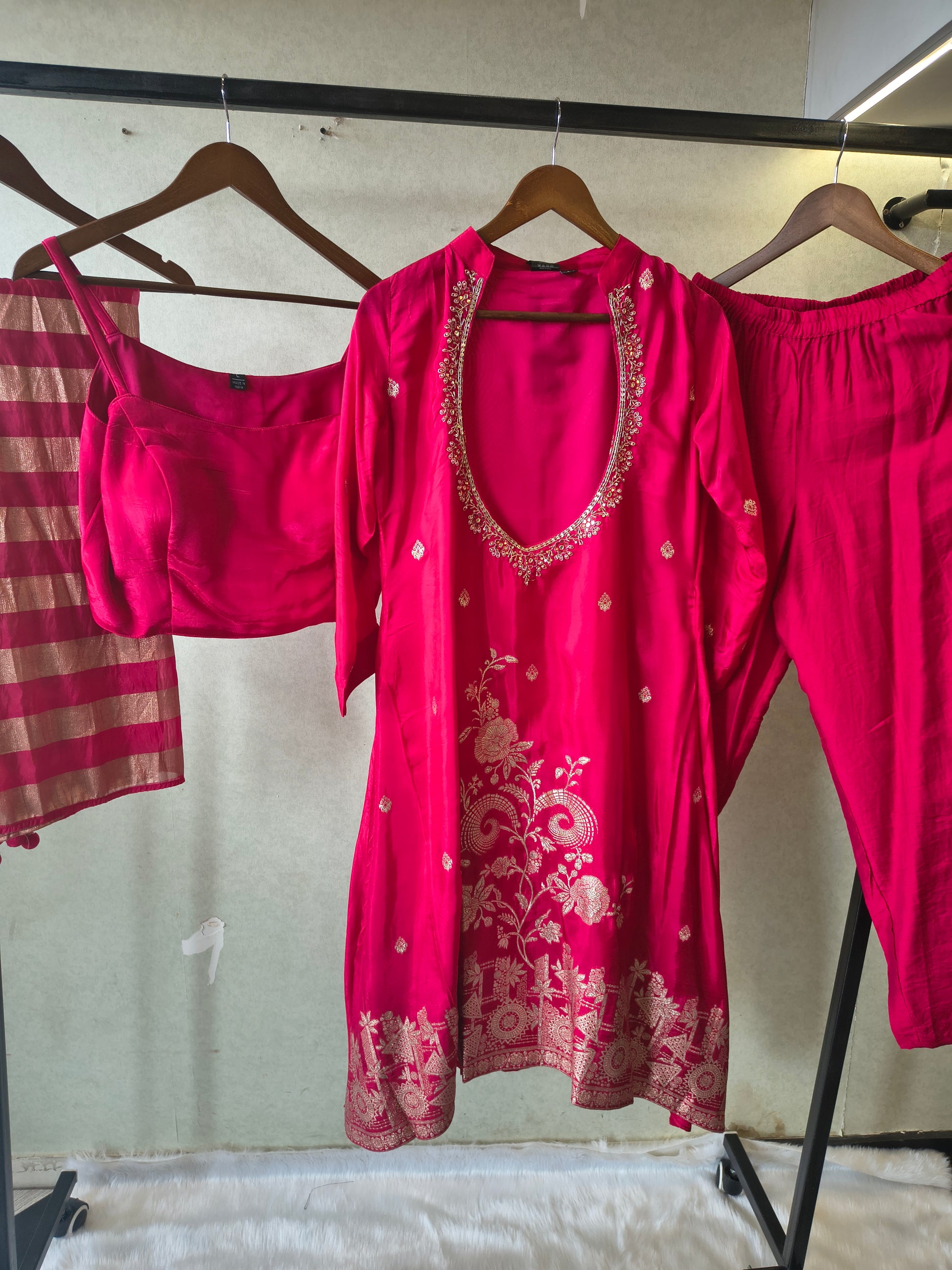 Rani Pink Embroidered Asymmetrical Kurta with Inner, Cigarette Pants & Metallic Striped Dupatta – 4 Piece Designer Festive Set
