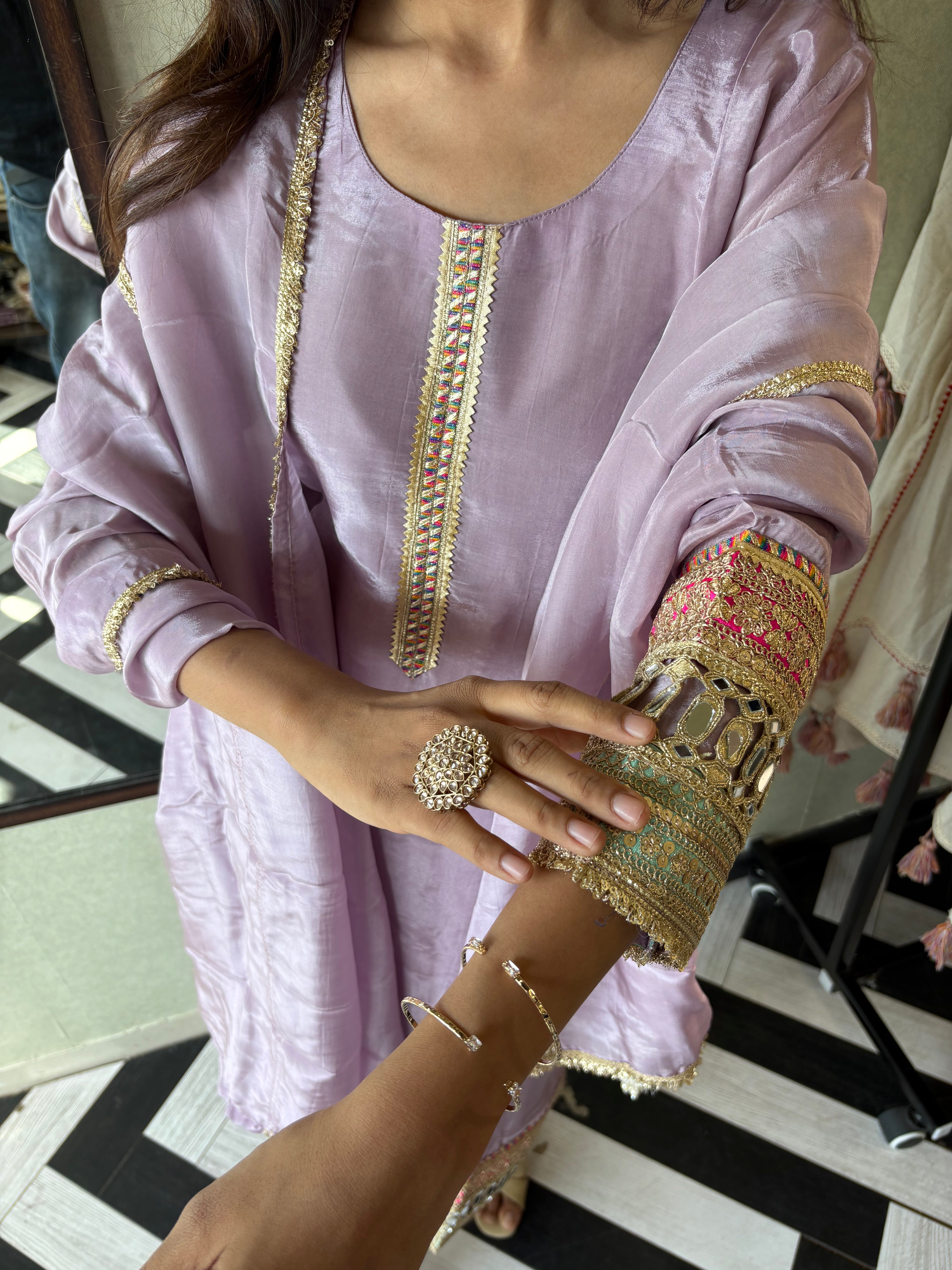 Image of Shine Bright in Royal Magenta!

Crafted in pure silk crepe, this designer straight-cut kurti set is finished with mirror handwork on sleeves and pant ends - a perfect blend of subtle glam and timeless class.