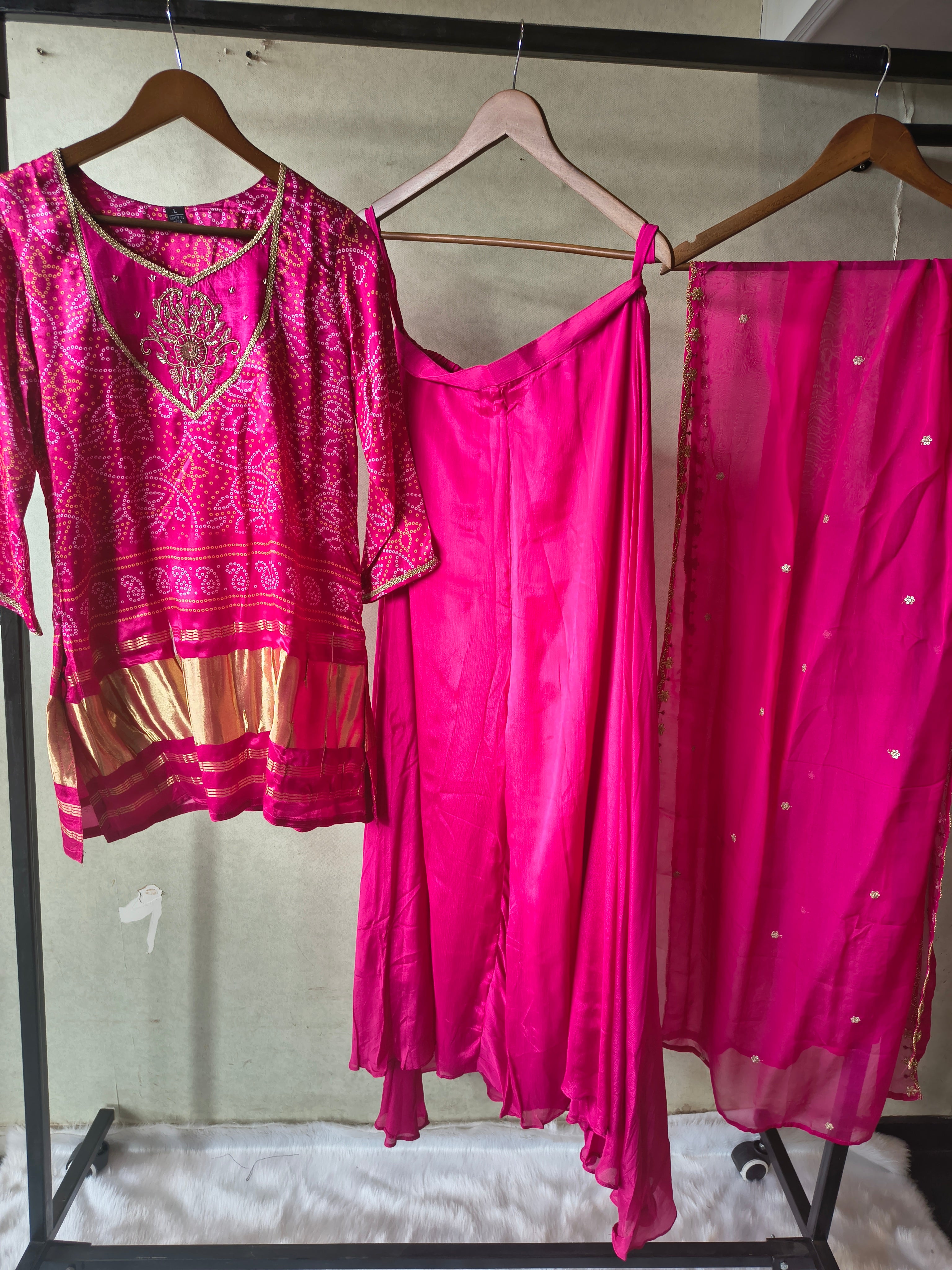 Image of Rani Pink Bandhani Sharara Set with Zari Border & Embroidered Dupatta – Premium 3 Piece Festive Ensemble