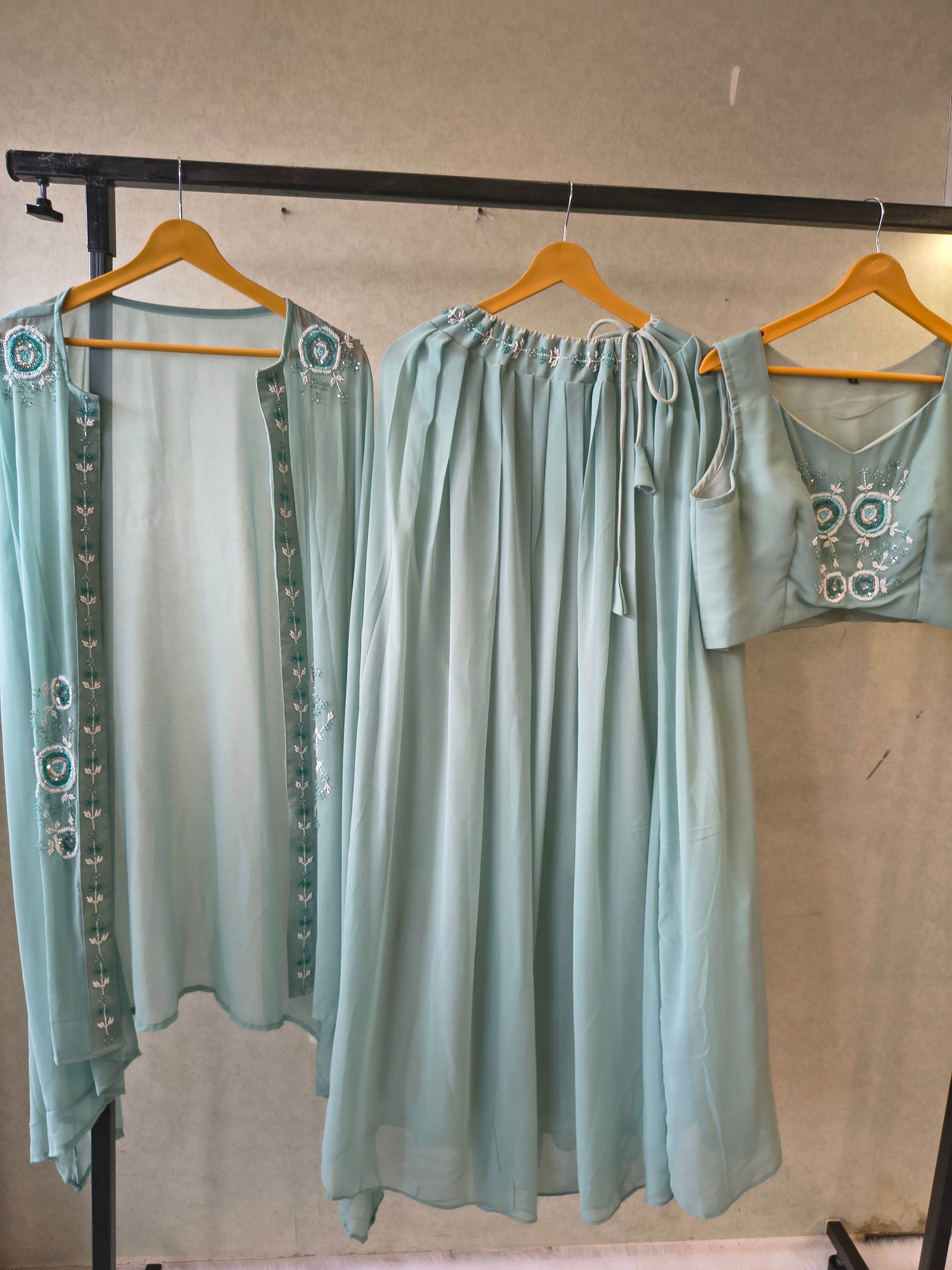 Image of Powder Blue Designer Crop Top Sharara Set with Embroidered Cape & Flared Palazzo | Premium 3 Piece Occasion Wear