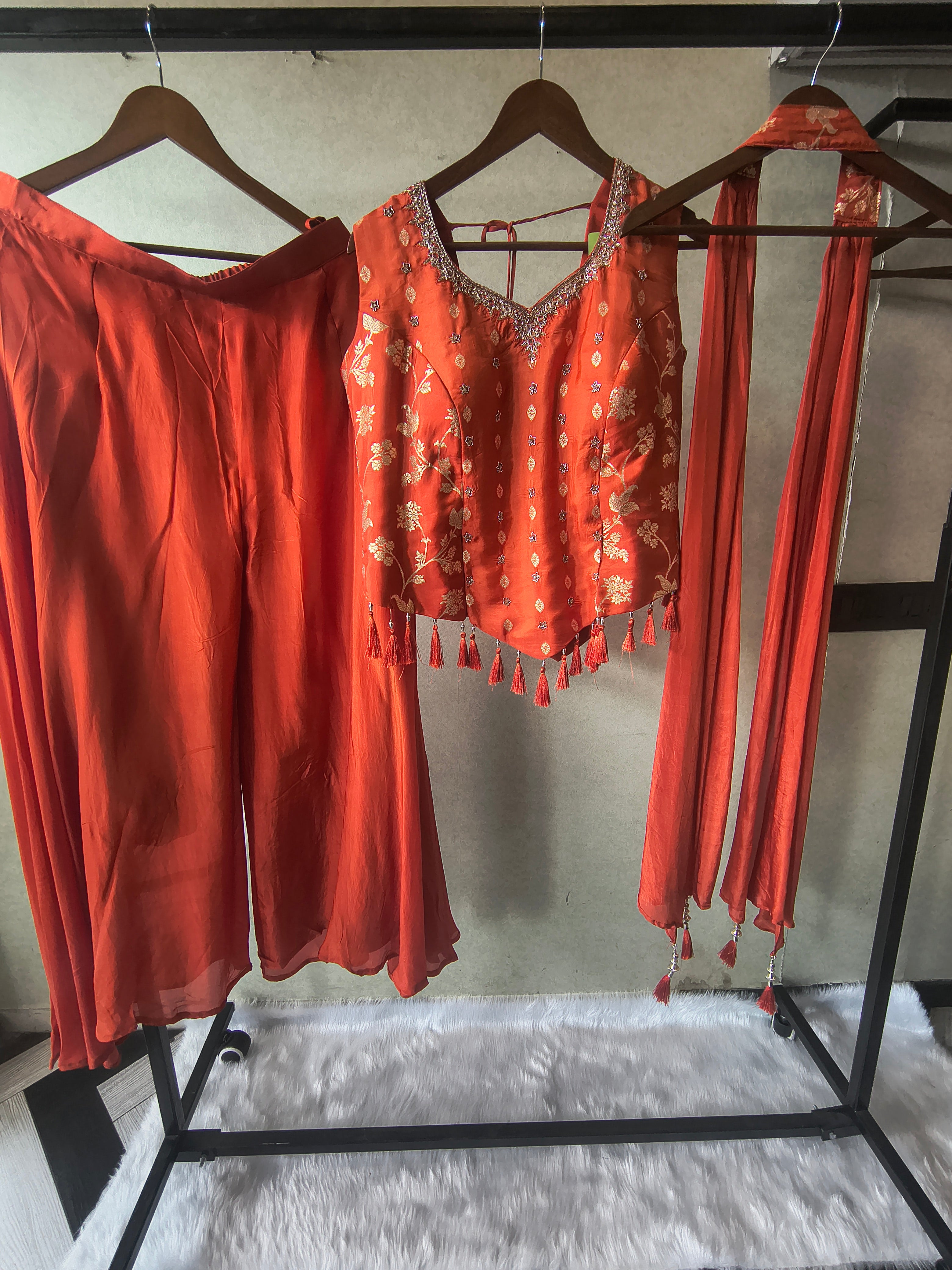 Image of Premium Rust Orange 3-Piece Designer Lehenga Set with Zari Embroidered Peplum Blouse & Tassel Dupatta
