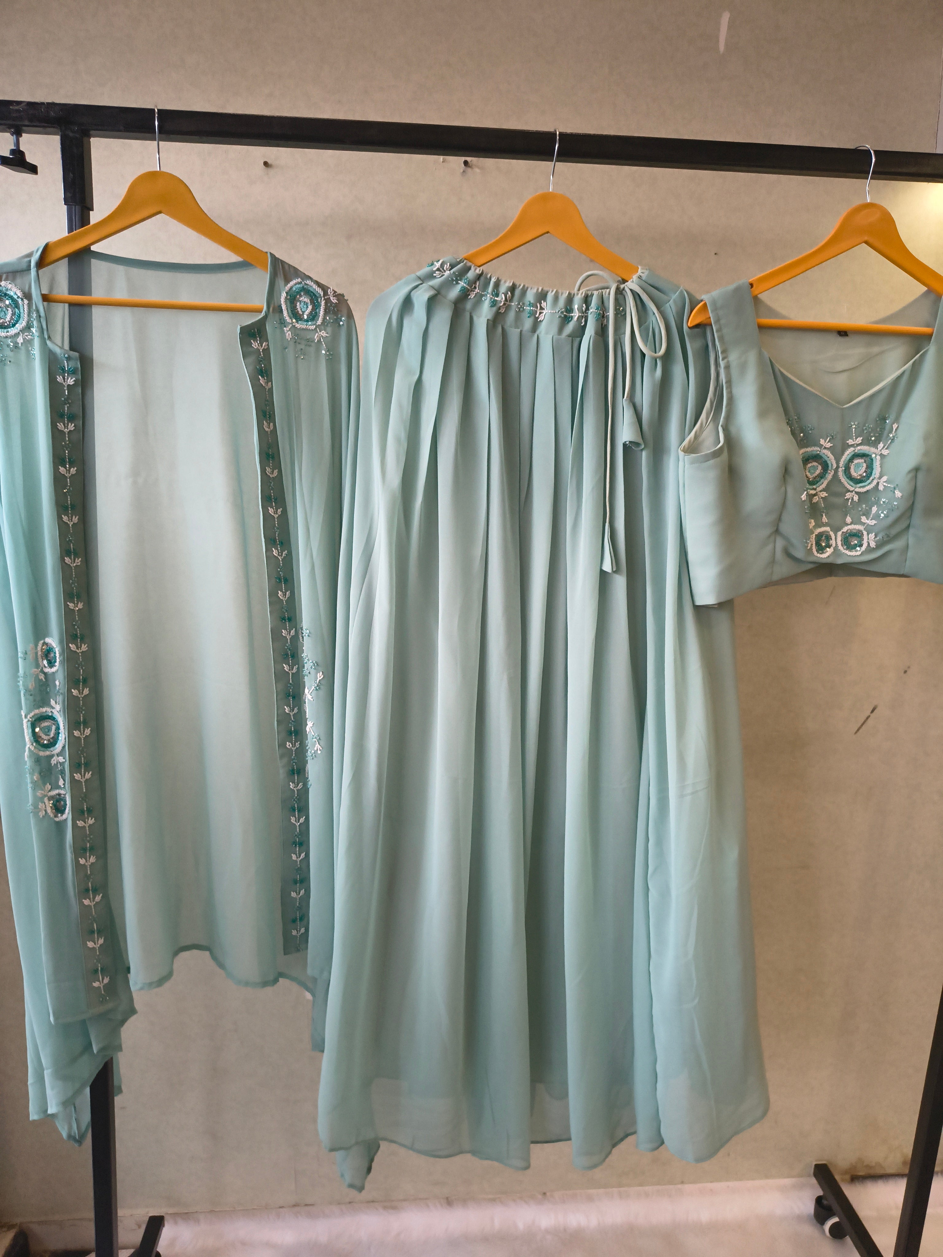 Image of Powder Blue Designer Crop Top Sharara Set with Embroidered Cape & Flared Palazzo | Premium 3 Piece Occasion Wear