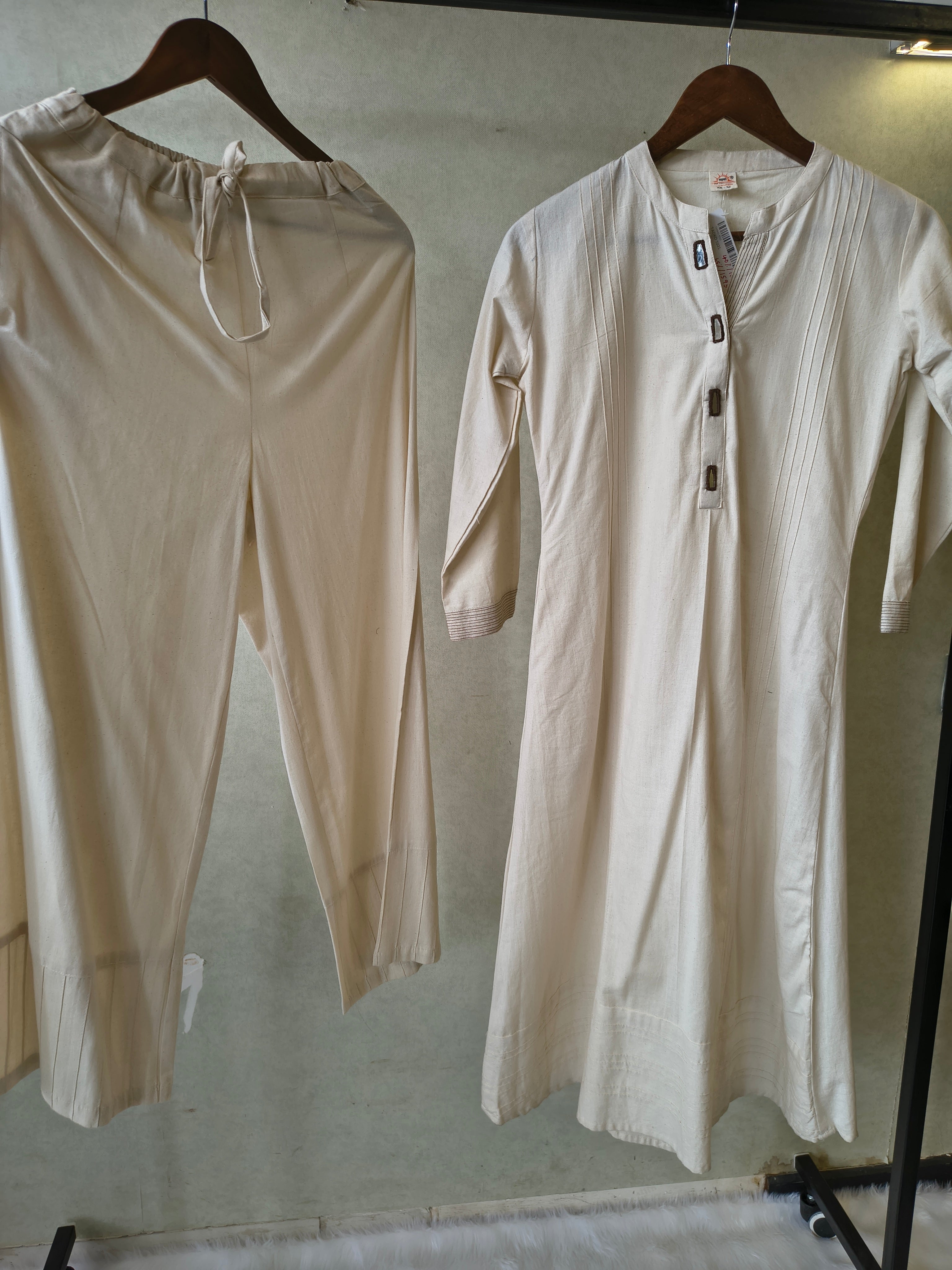 Image of Premium Off-White Cotton A-Line Kurta & Pant Co-Ord Set with Pintuck Detailing