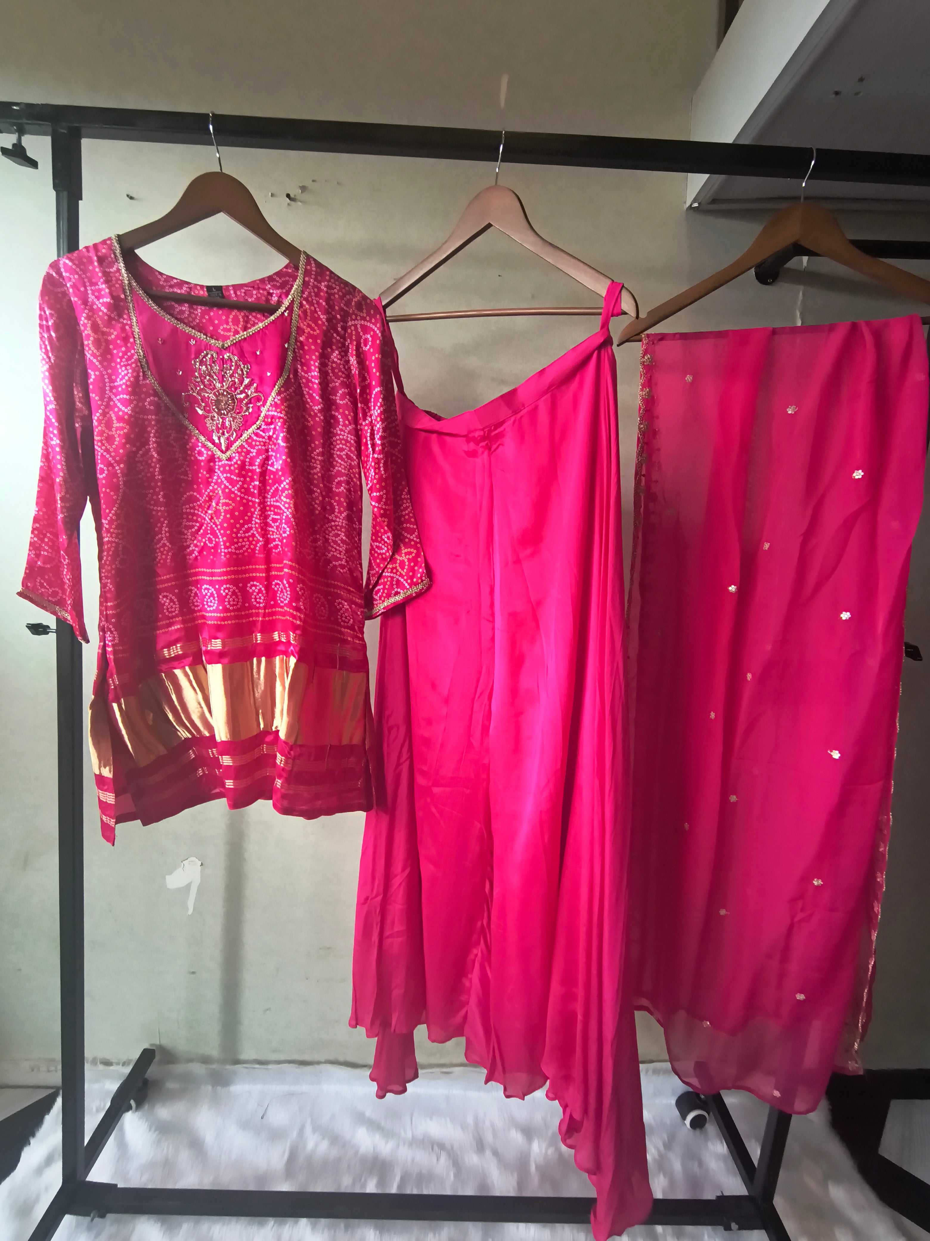 Image of Rani Pink Bandhani Sharara Set with Zari Border & Embroidered Dupatta – Premium 3 Piece Festive Ensemble