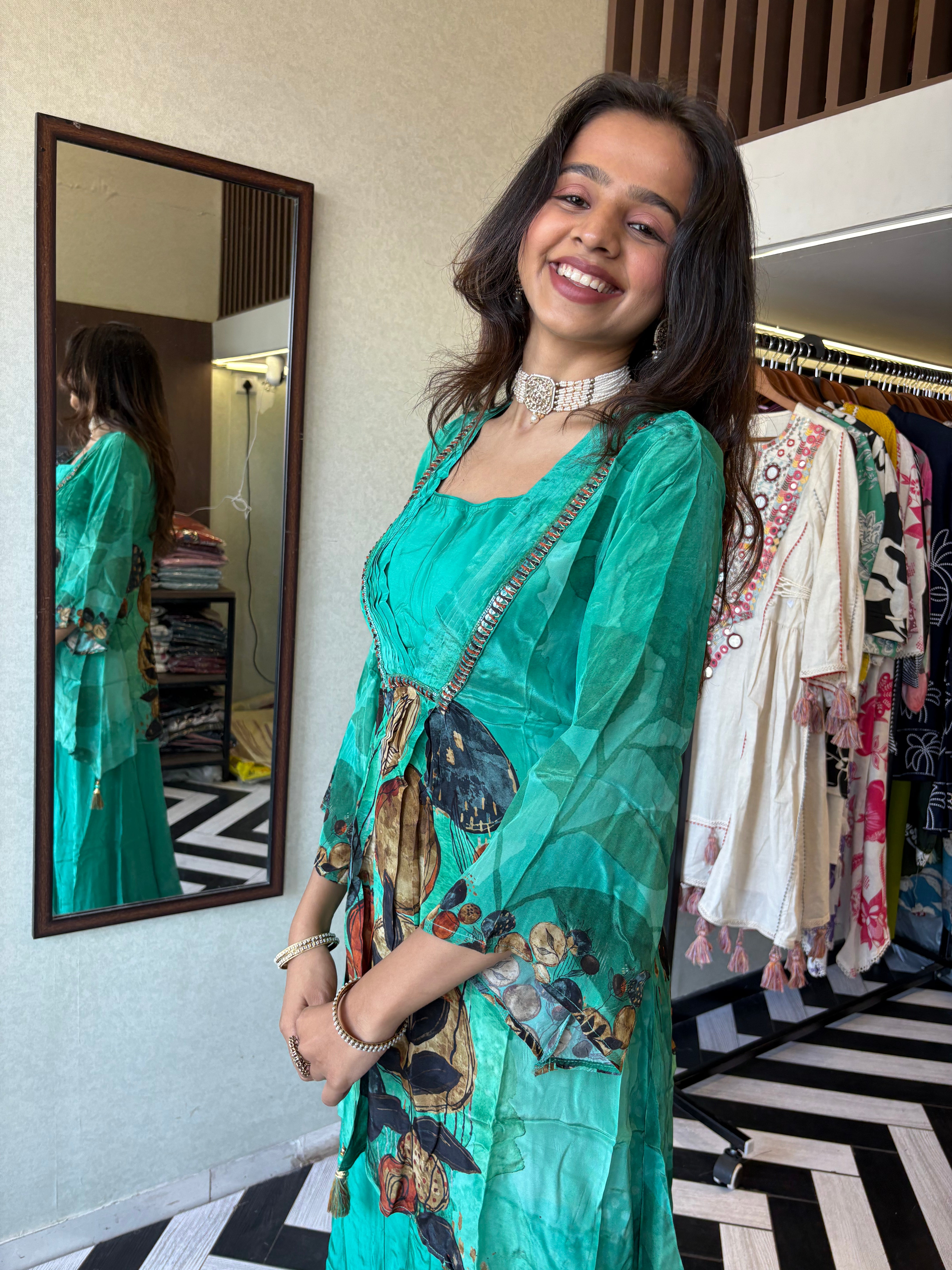 Image of Step into the celebration with our Designer Crepe 2-Piece Set in a refreshing green hue, crafted with intricate detailing and effortless grace