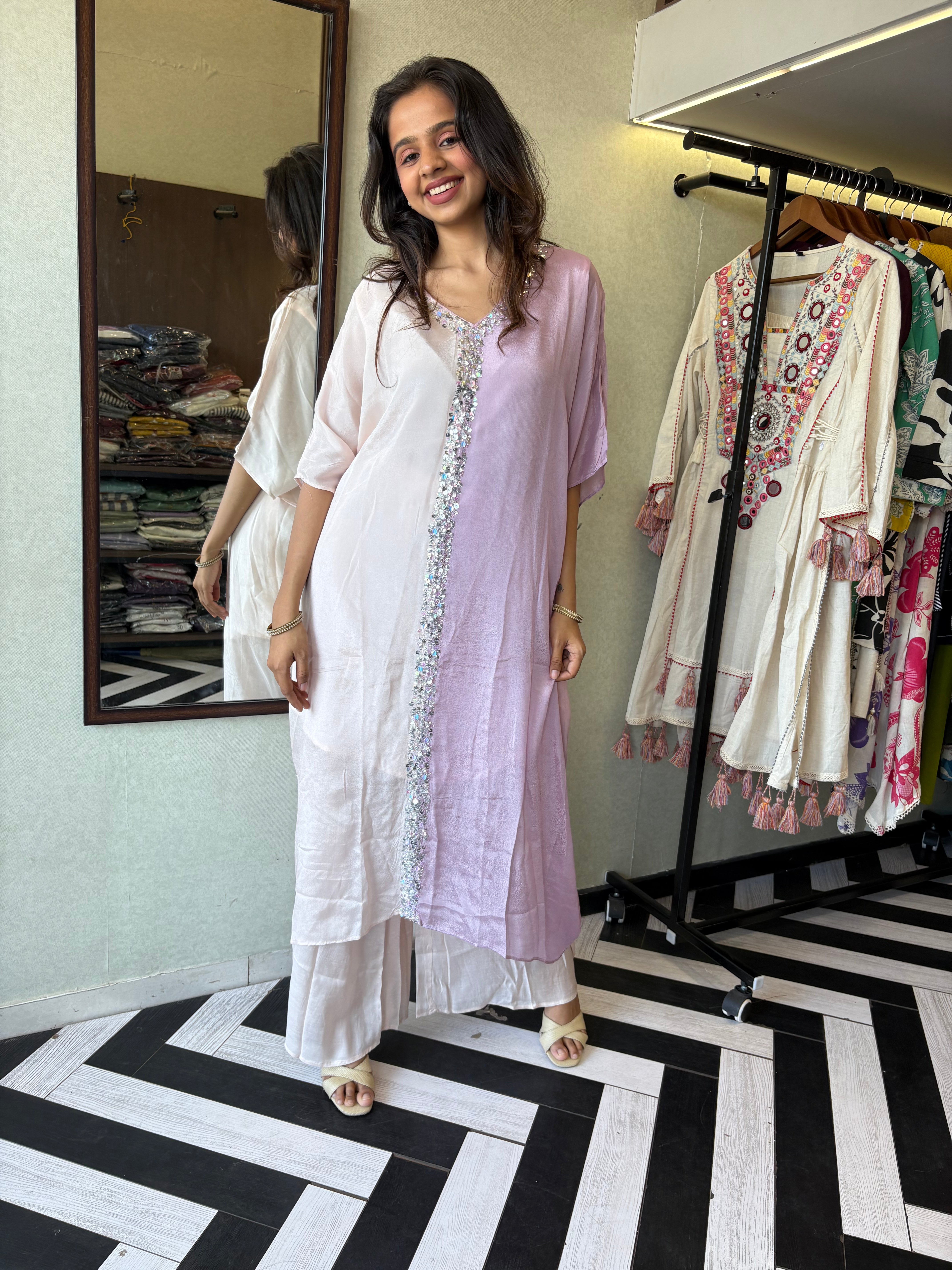 Image of Turn heads in this elegant 3-piece Indo-Western beauty crafted from pure crepe with a silk base - featuring:

Gorgeous double-shade rose color

Center hand-sequence work that glistens with grace