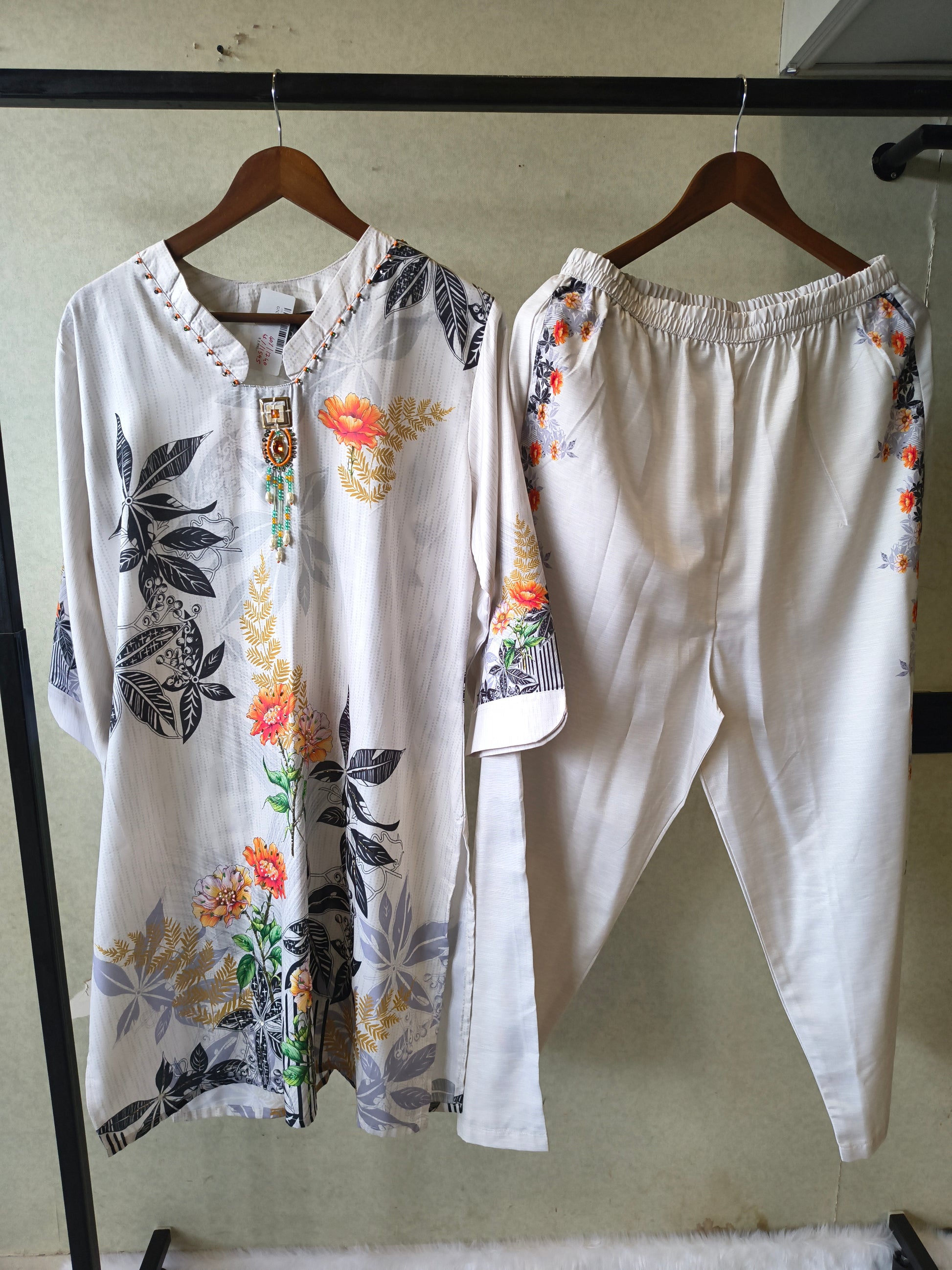 Premium Ivory Botanical Printed Kurta Set with Designer Pendant Neckline