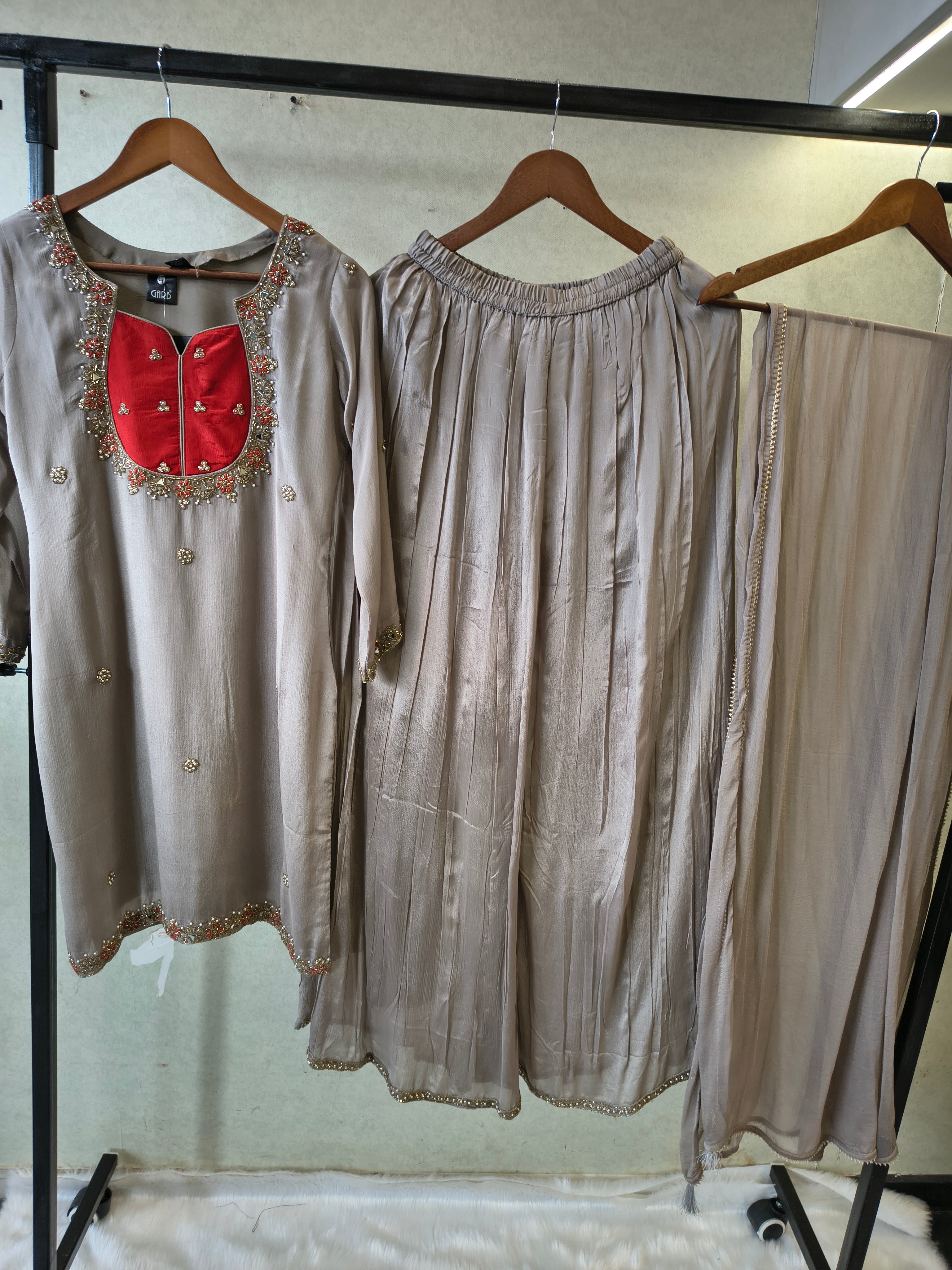 Image of Pearl Grey Embellished Straight Kurta Set with Handcrafted Neckline, Wide Palazzo & Chiffon Dupatta | Premium 3 Piece Festive Ensemble