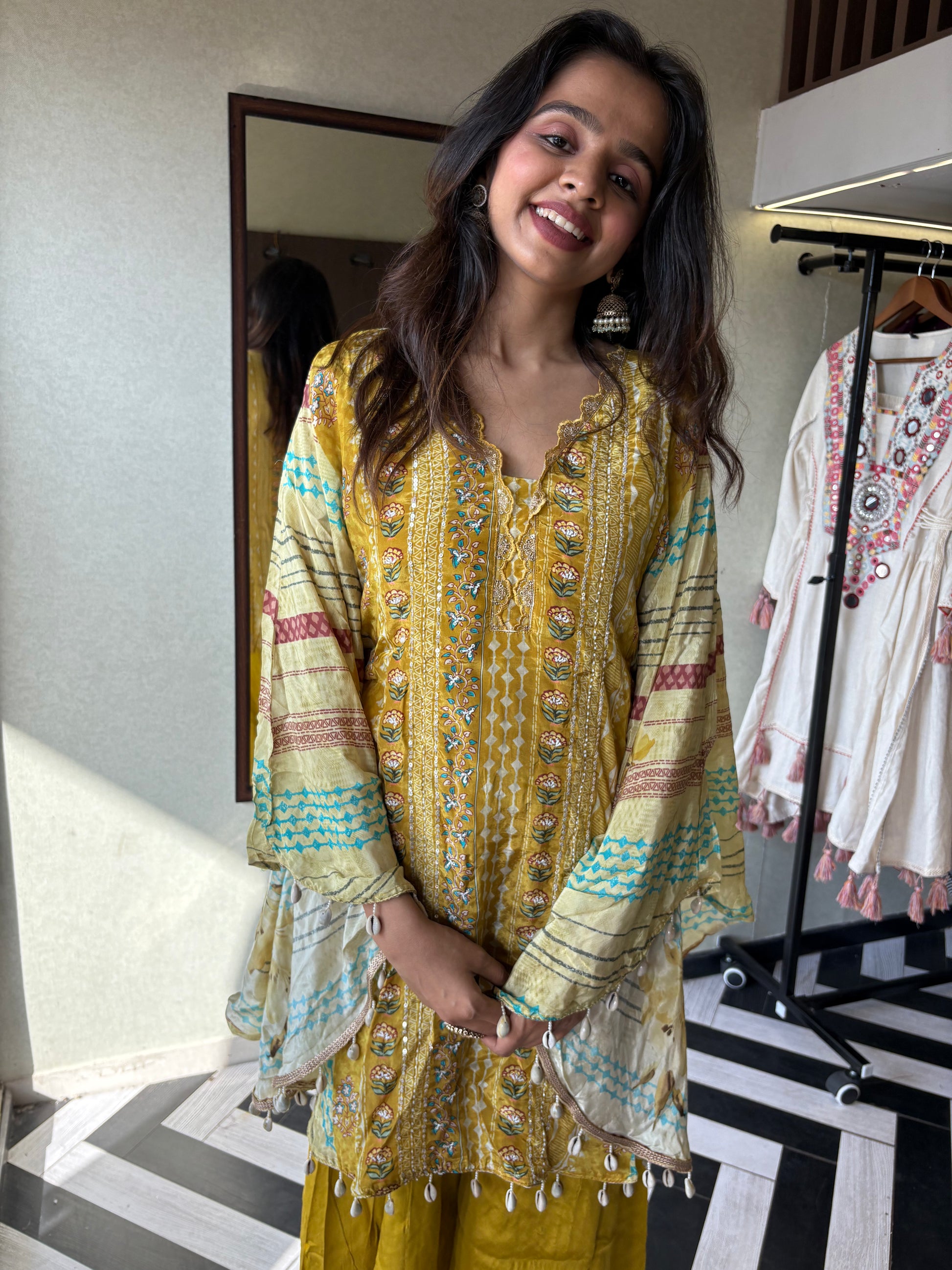 Crafted from pure crepe fabric with hand-sequenced accessory work - it's the sunshine outfit your wardrobe needs!