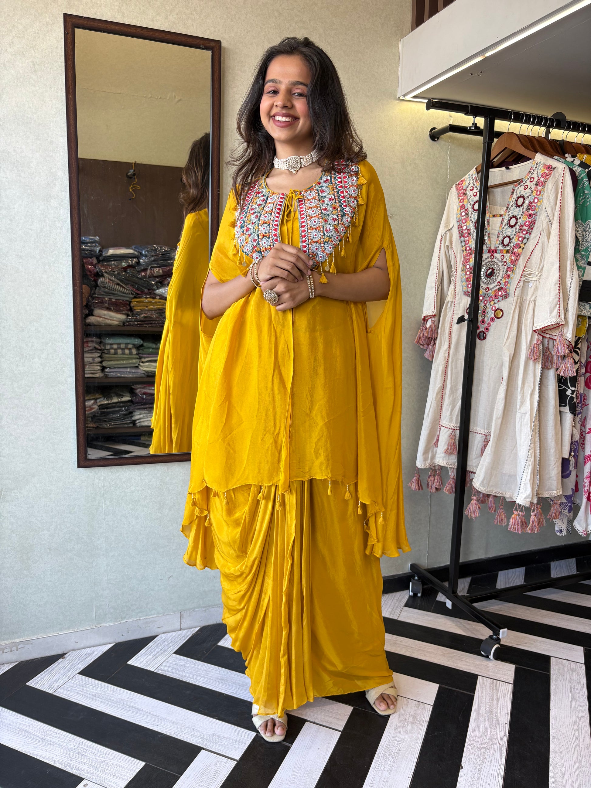 Step into the spotlight with our stunning yellow pure georgette Indo-Western 2-piece. Designed with intricate handwork and full sequin craftsmanship, this piece delivers pure elegance for those who love to shine bright
