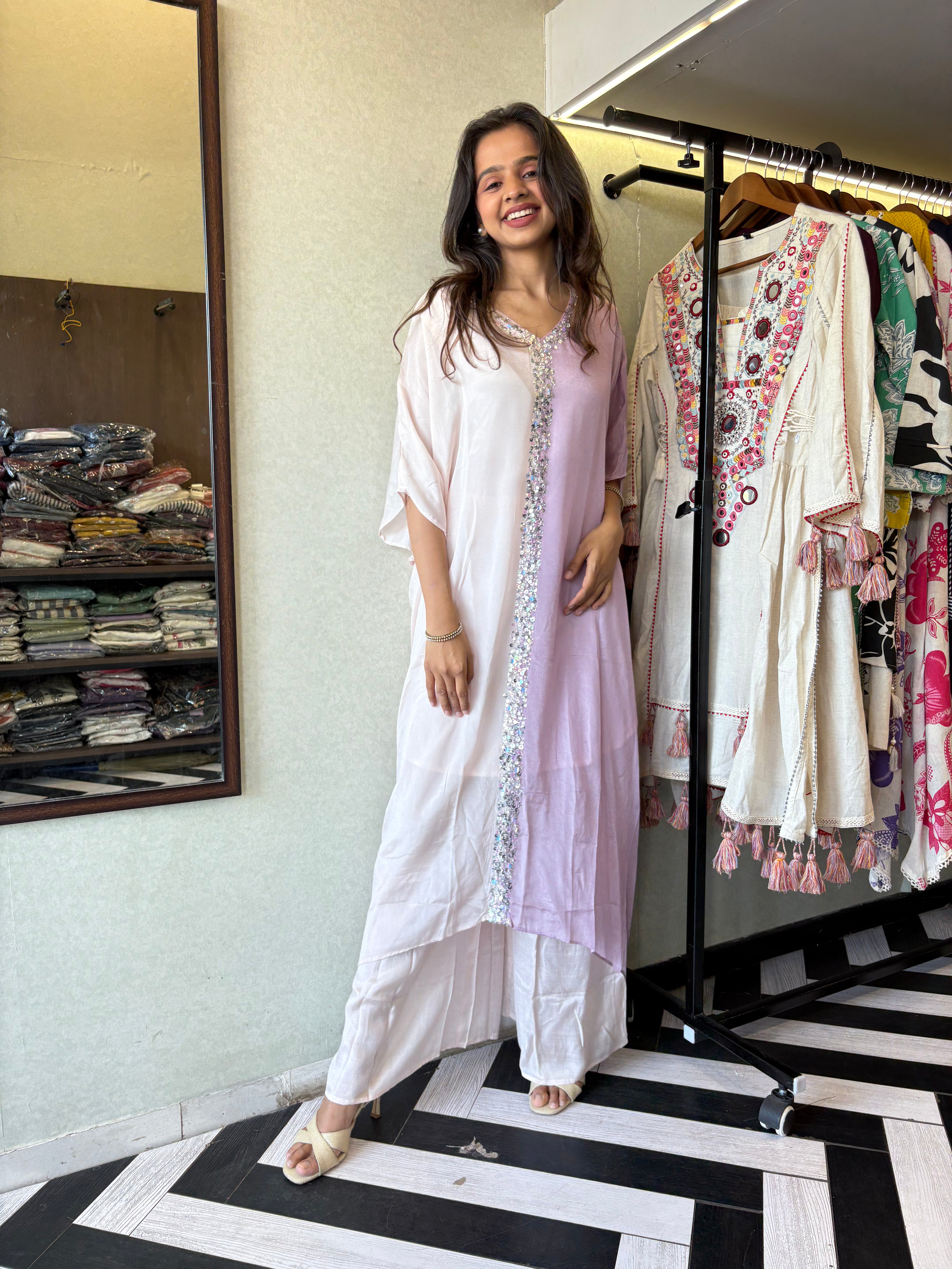 Image of Turn heads in this elegant 3-piece Indo-Western beauty crafted from pure crepe with a silk base - featuring:

Gorgeous double-shade rose color

Center hand-sequence work that glistens with grace