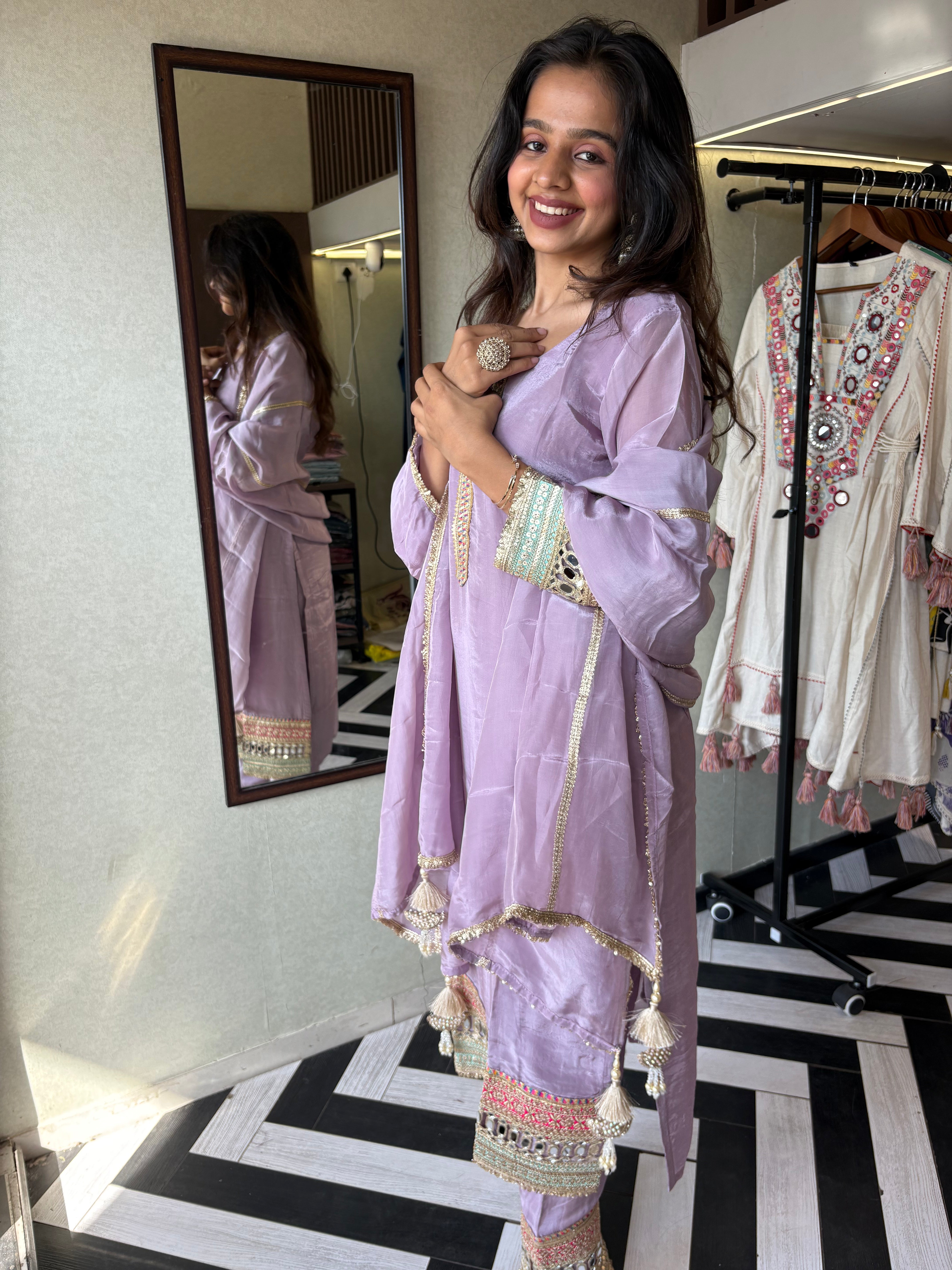 Shine Bright in Royal Magenta!

Crafted in pure silk crepe, this designer straight-cut kurti set is finished with mirror handwork on sleeves and pant ends - a perfect blend of subtle glam and timeless class.