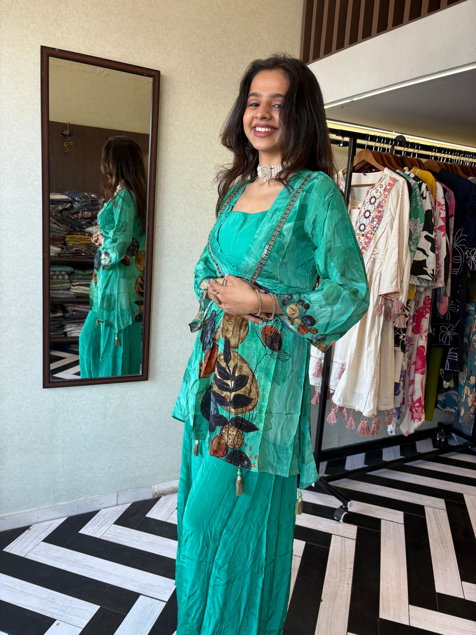 Step into the celebration with our Designer Crepe 2-Piece Set in a refreshing green hue, crafted with intricate detailing and effortless grace