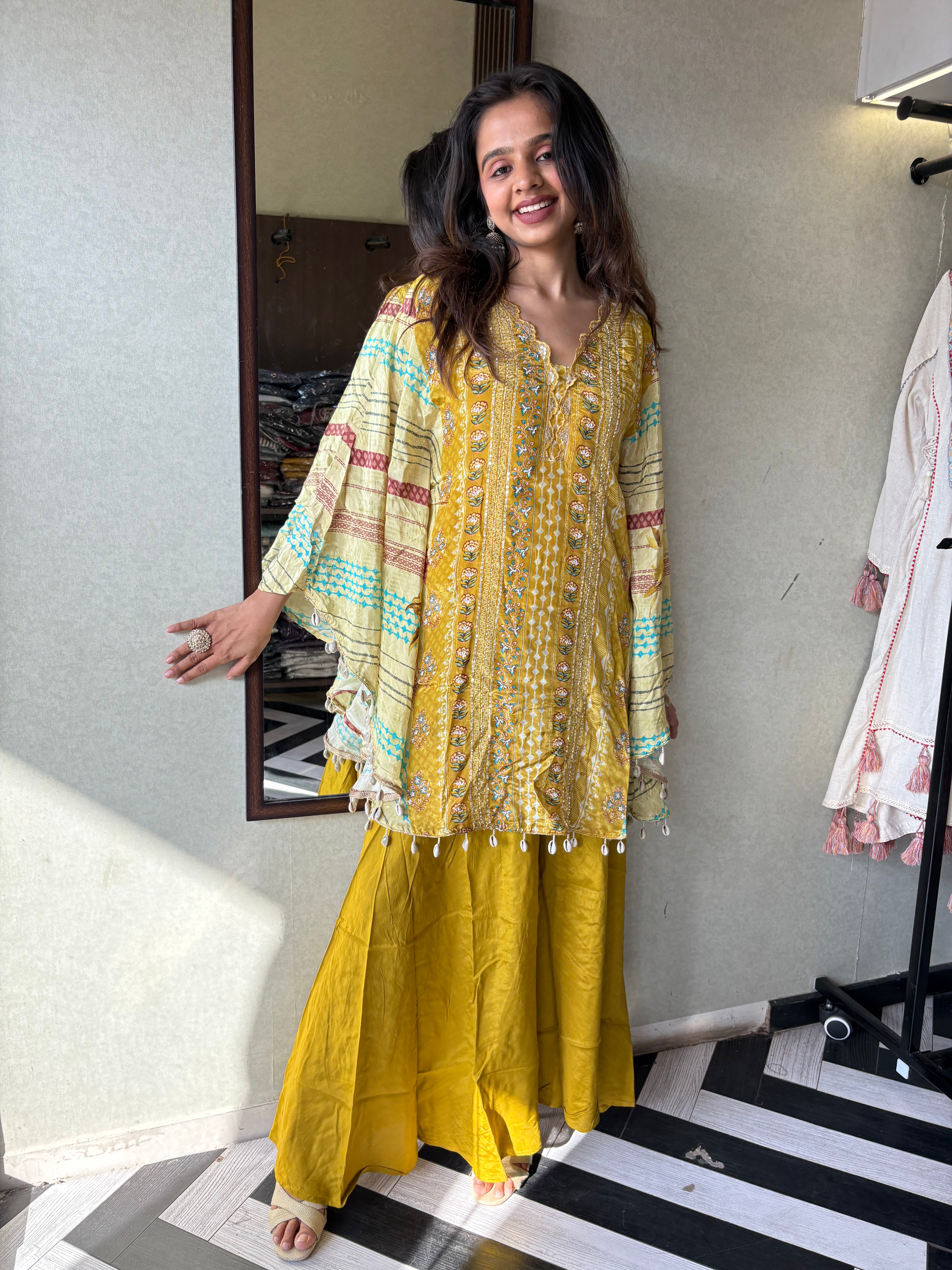 Image of Crafted from pure crepe fabric with hand-sequenced accessory work - it's the sunshine outfit your wardrobe needs!