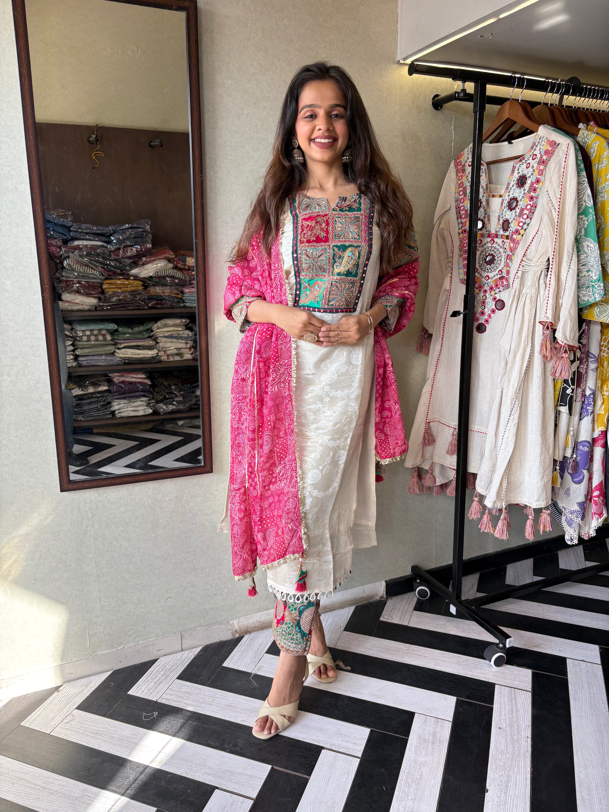 This pure cotton co-ord set in a designer white print is your summer savior - soft on the skin, bold on fashion