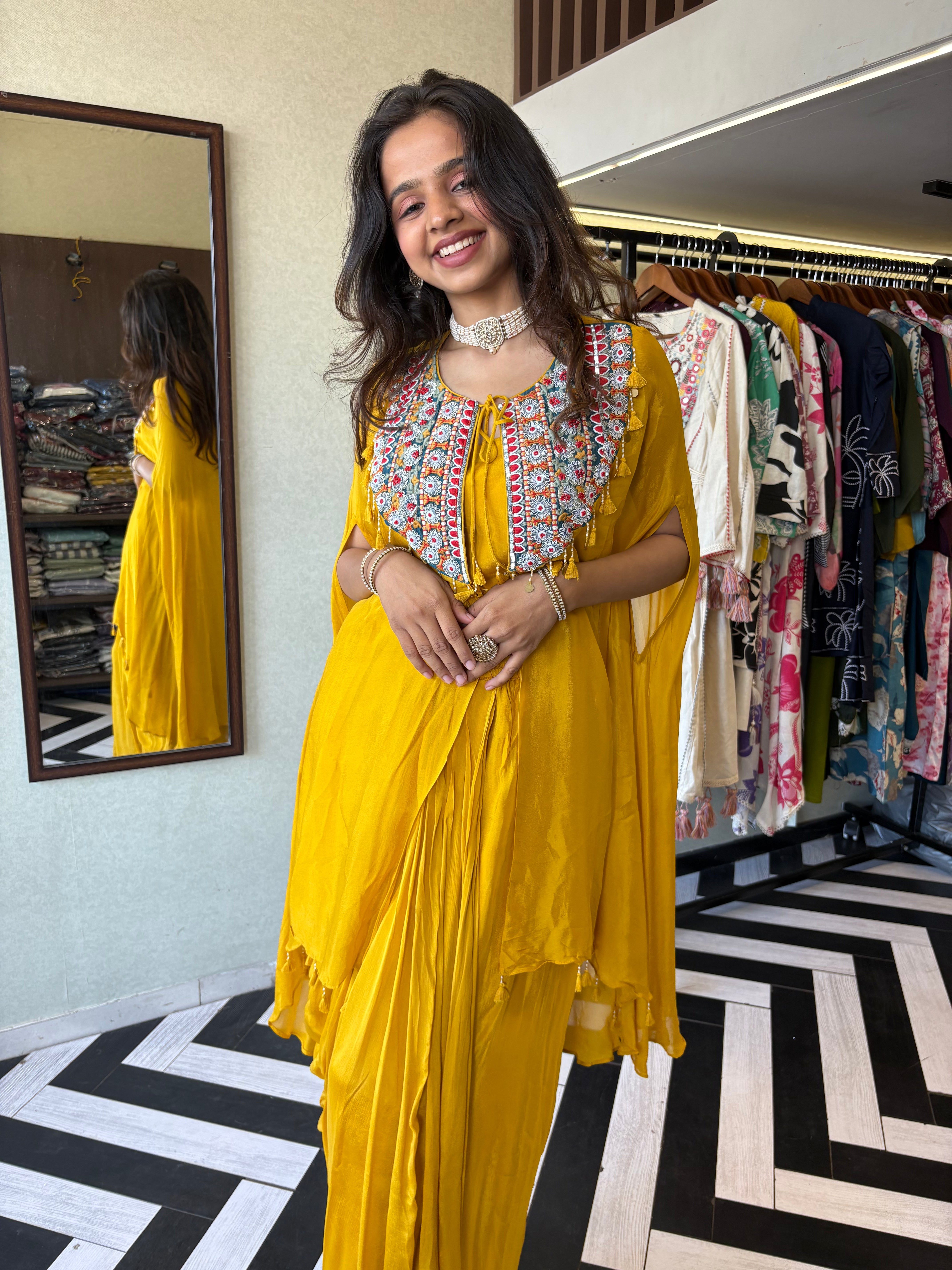 Image of Step into the spotlight with our stunning yellow pure georgette Indo-Western 2-piece. Designed with intricate handwork and full sequin craftsmanship, this piece delivers pure elegance for those who love to shine bright